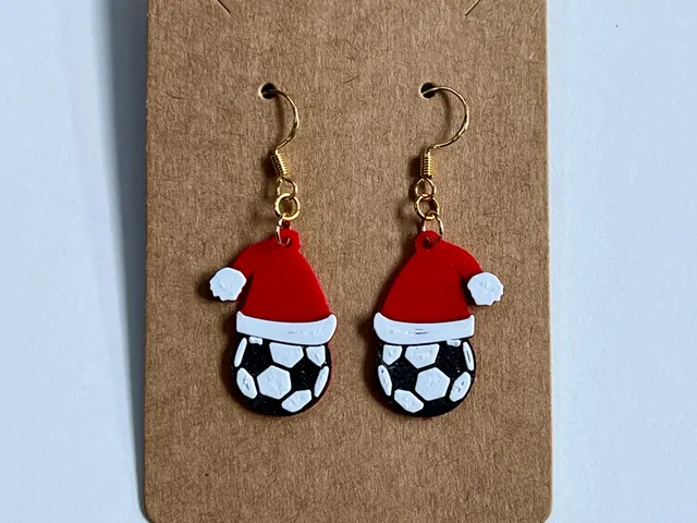 Christmas Earrings with Soccer Ball Wearing a Santa Hat