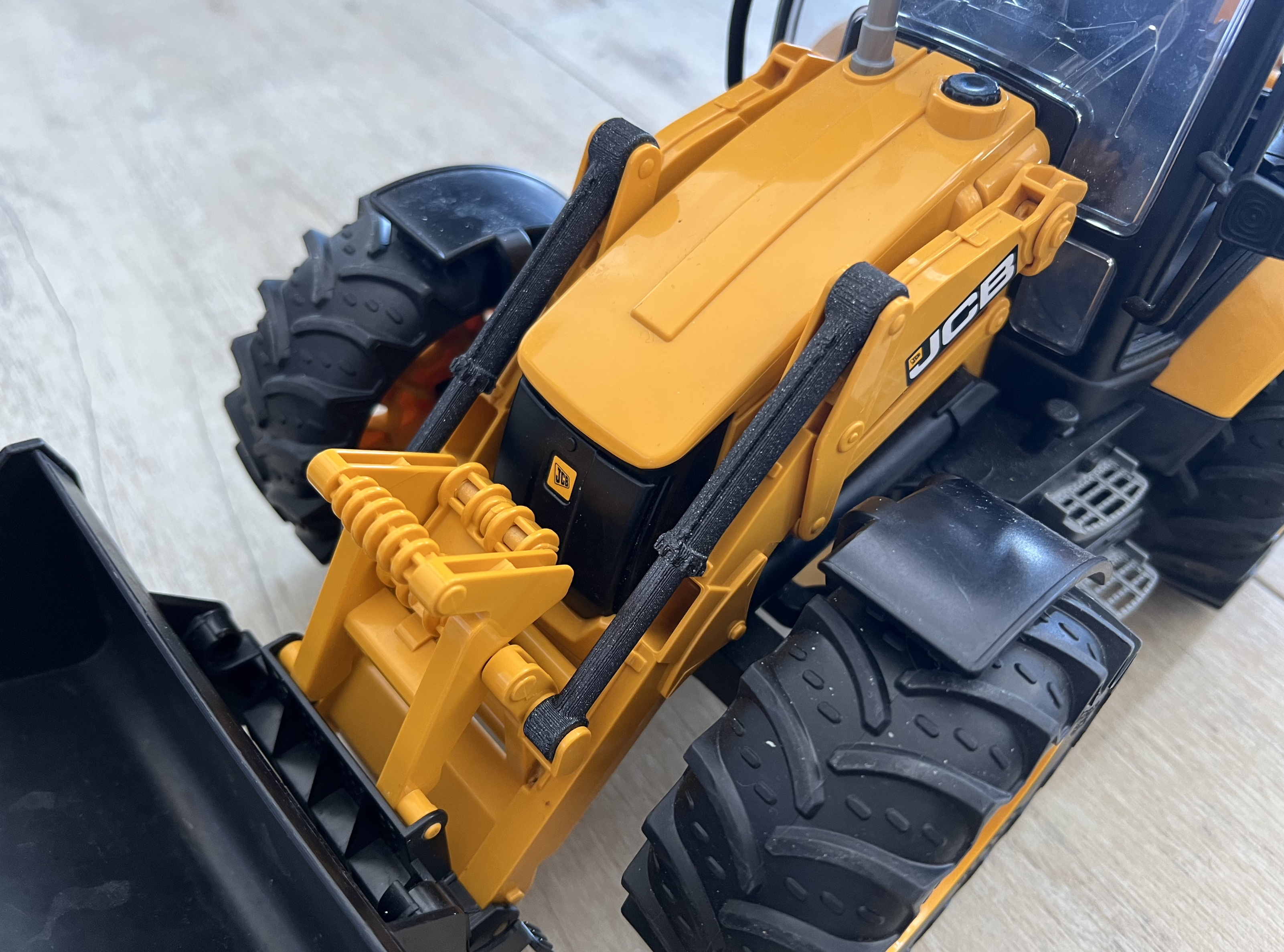 Bruder JCB 5CX front arm part
