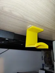 Earphone holder under table