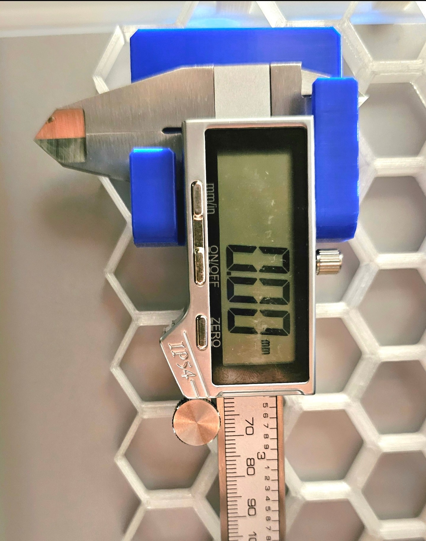 Digital Caliper holder for Honeycomb storage wall