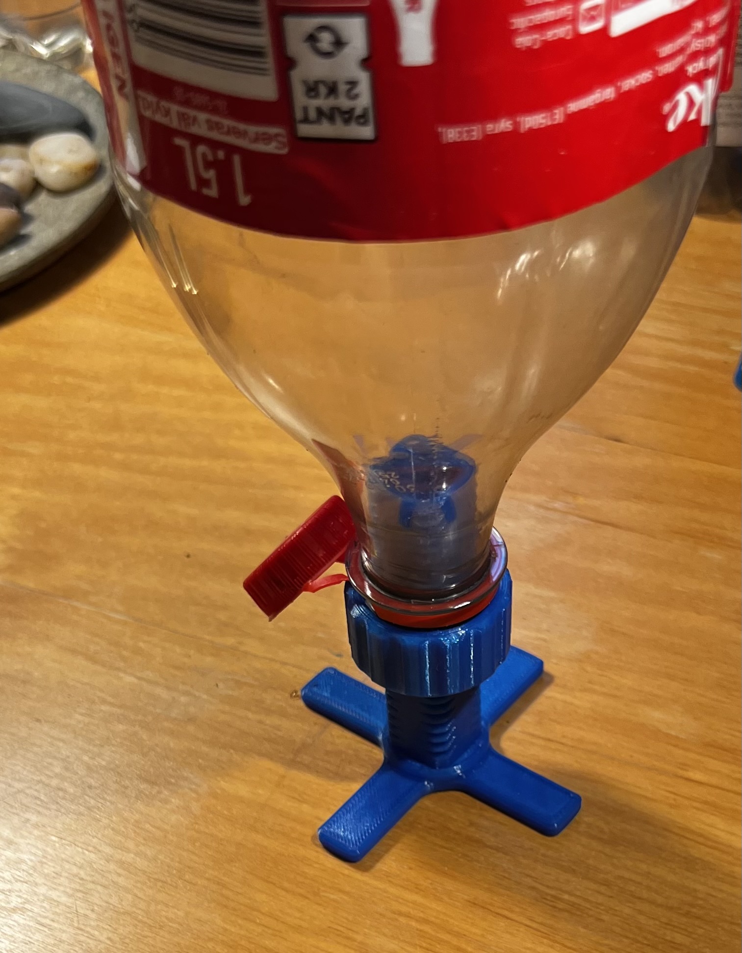 PET bottle adjustable height stand for plant watering