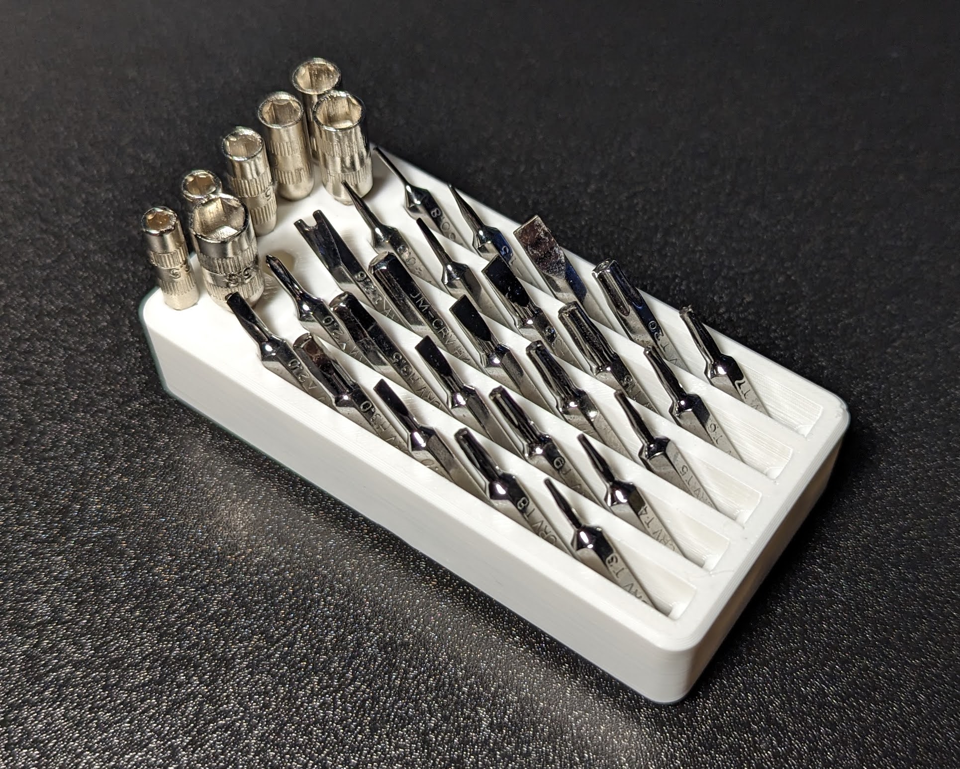 Gridfinity Compact 4mm Bit Holder With Large Bit Storage by Jacob