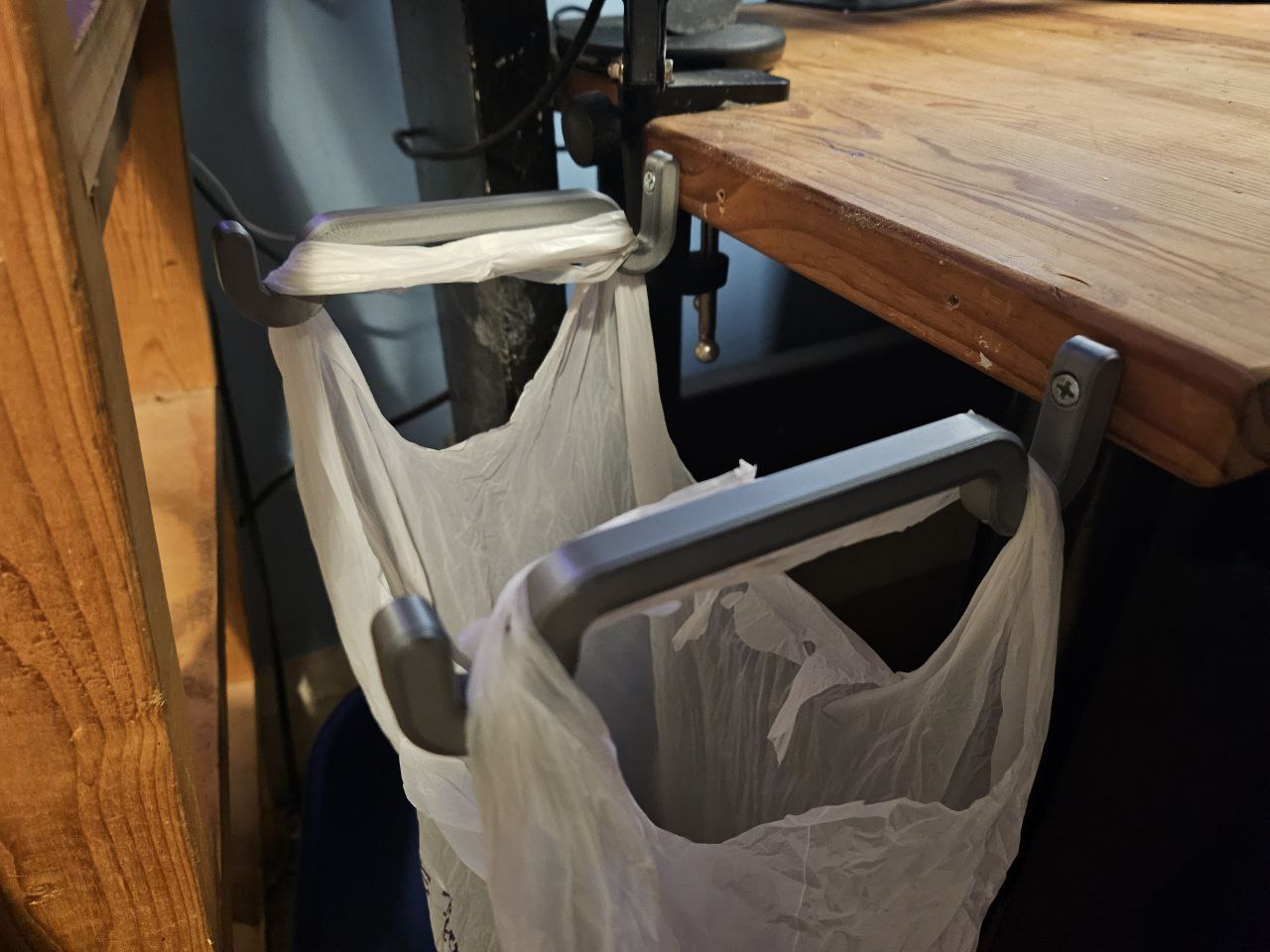 Grocery store bag hooks for using as a trash bin