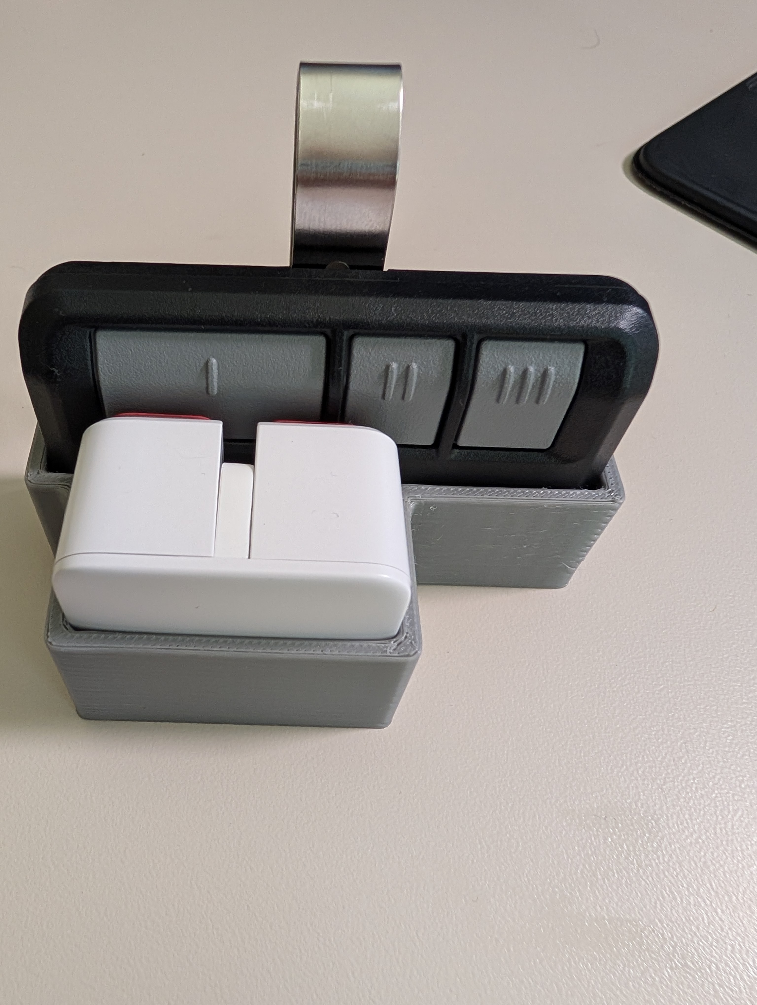 Chamberlain Garage Door Clicker opener with SwitchBot button Pusher