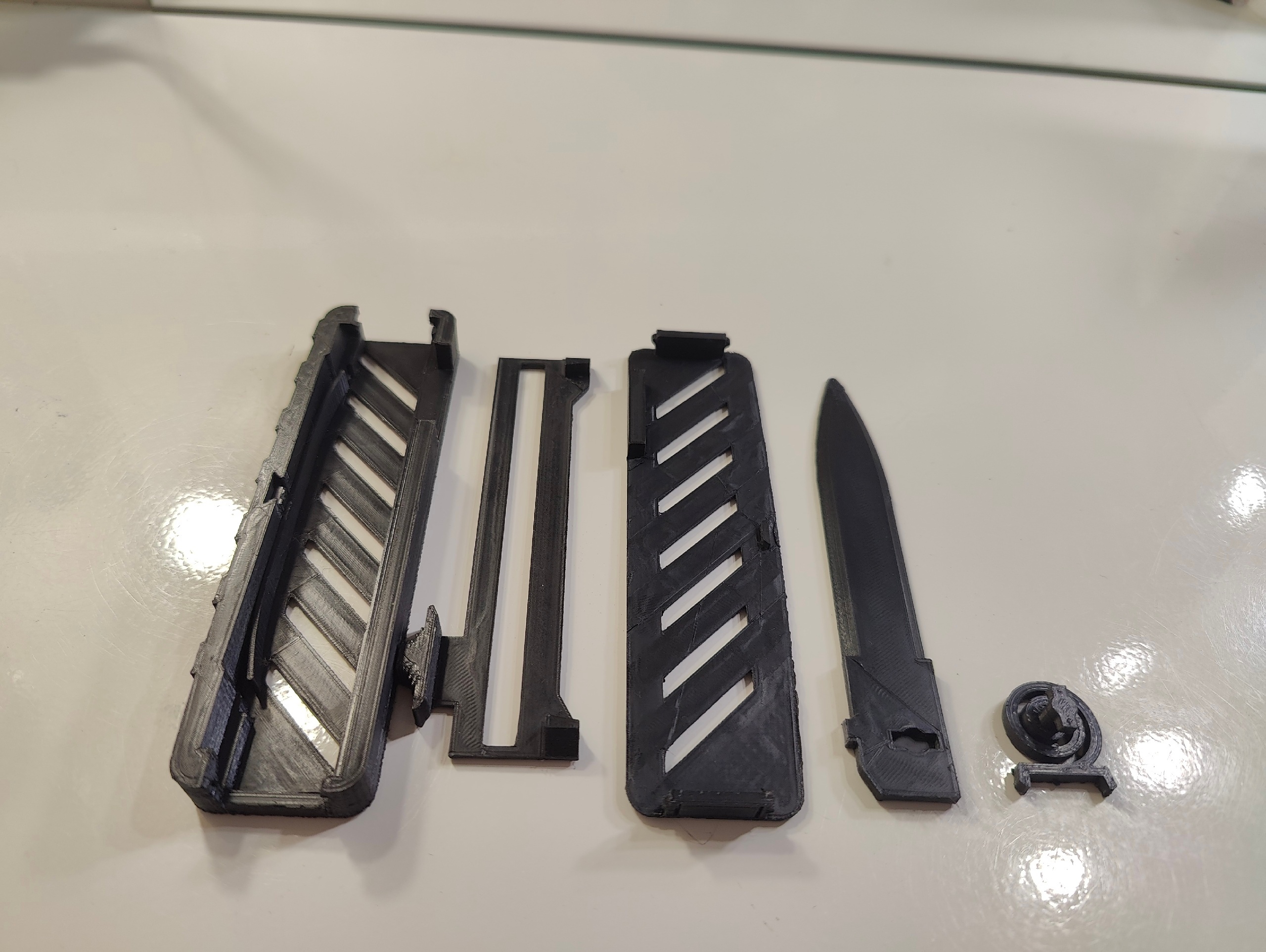 More durable spring attachment for no rubberband OTF