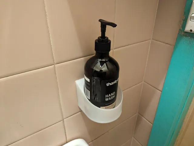 Wall Bottle Holder (Uses Command Strips) (OpenSCAD Customiseable)