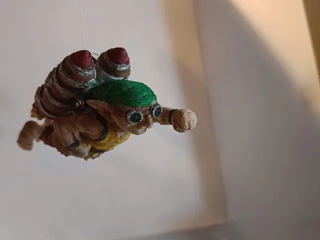 Goblin flying with a rocket jetpack