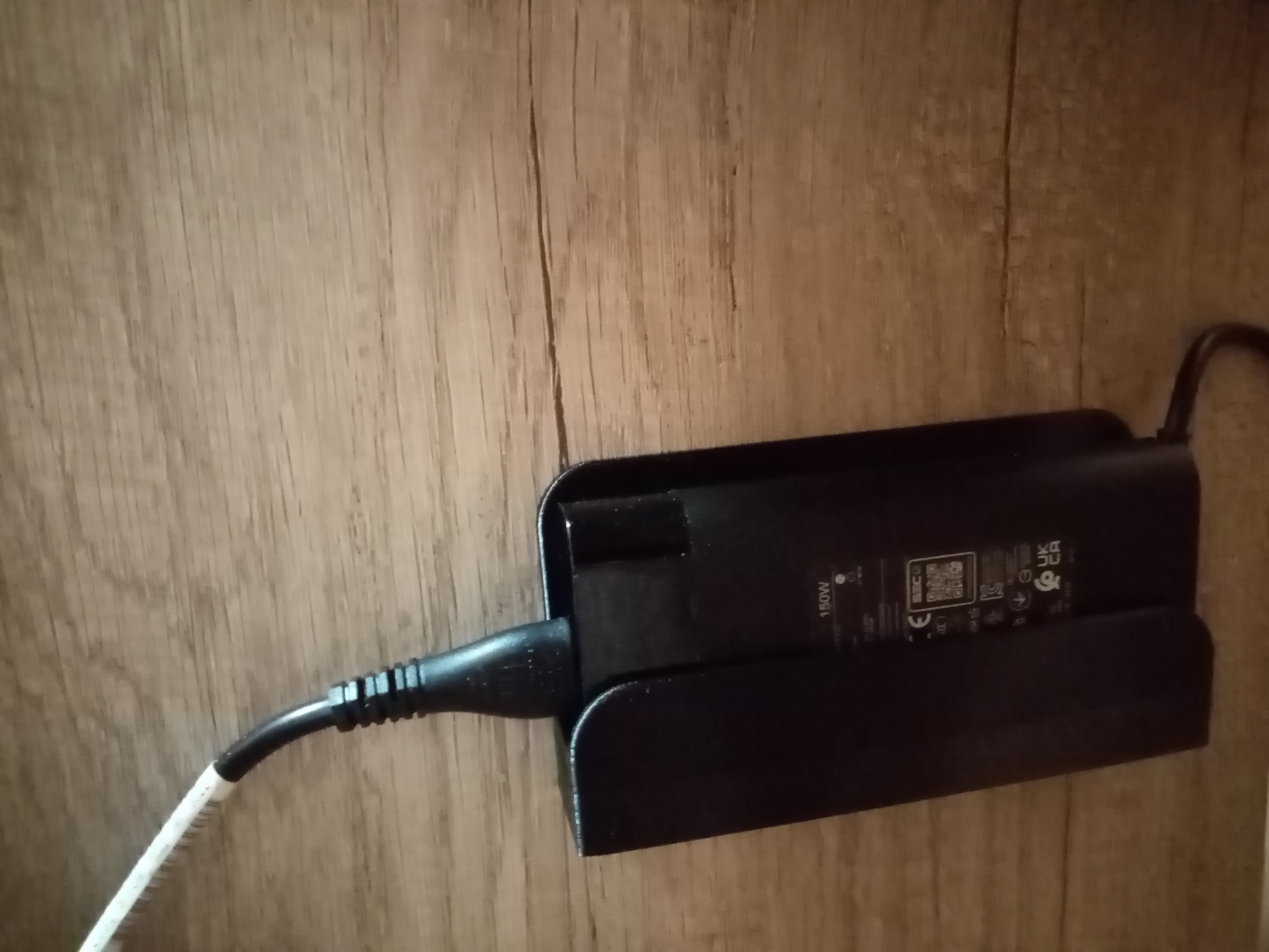 Držák nabíječky notebooku HP