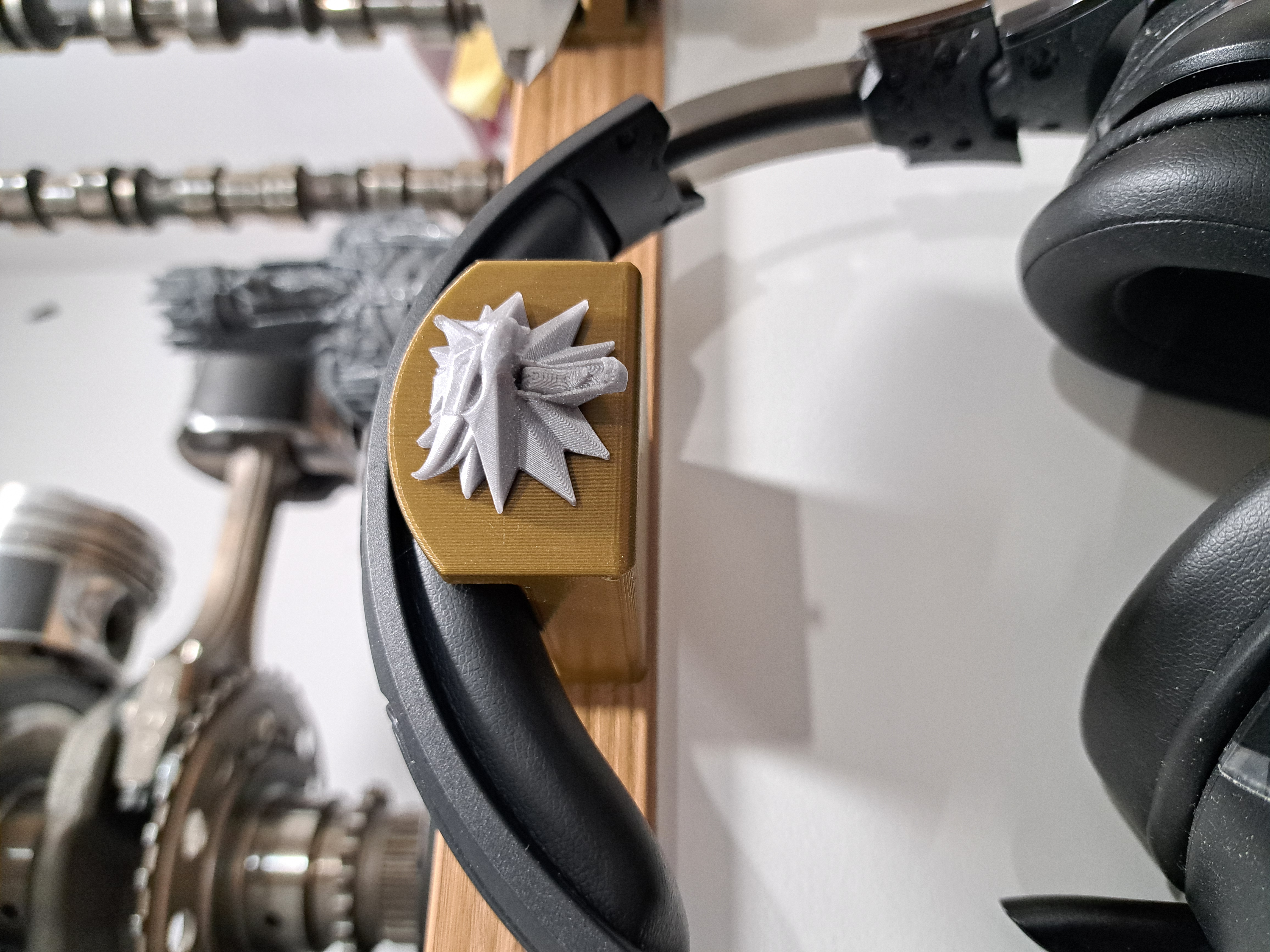 Headphone holder with Witcher medalion
