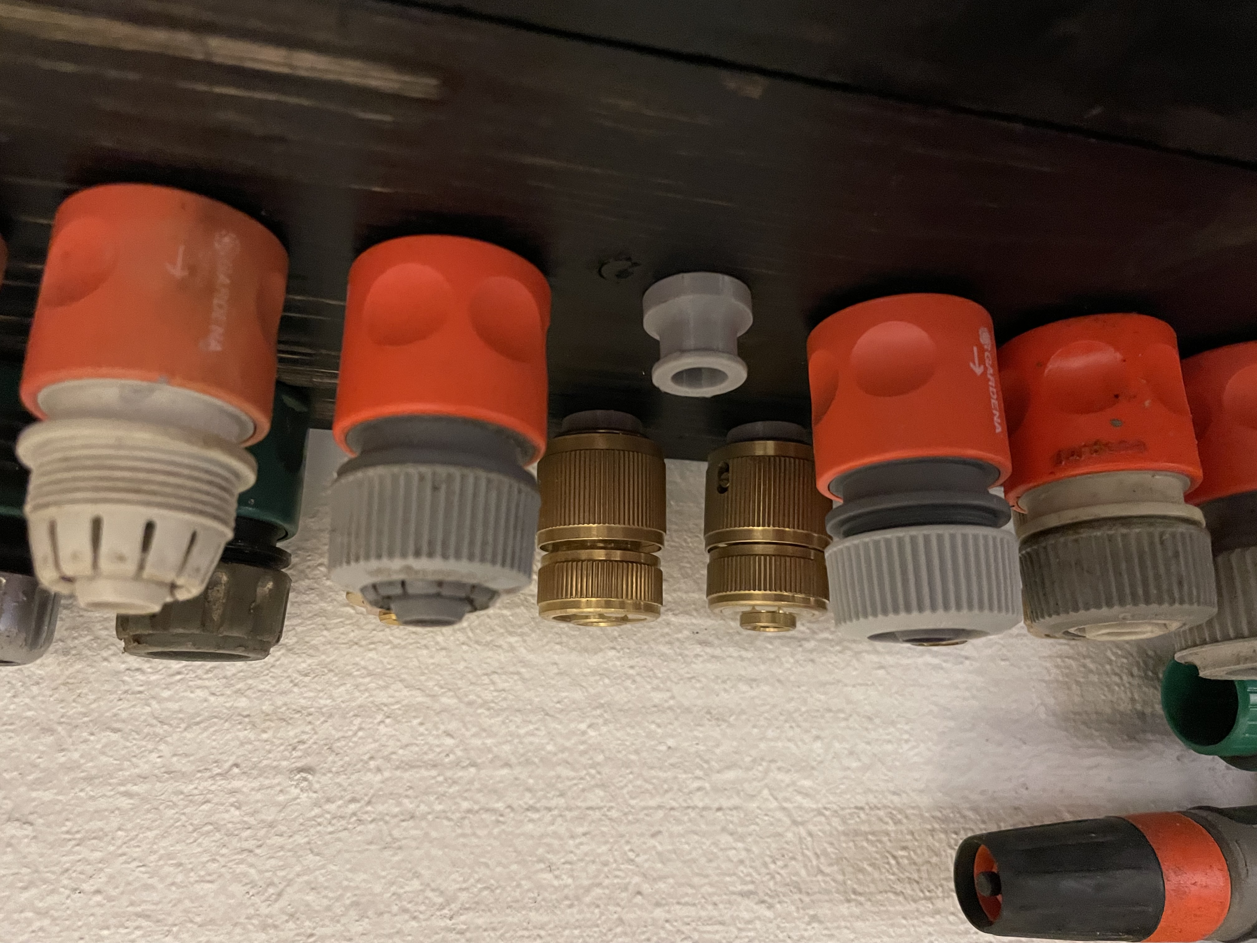 Hose connector wall/ceiling storage