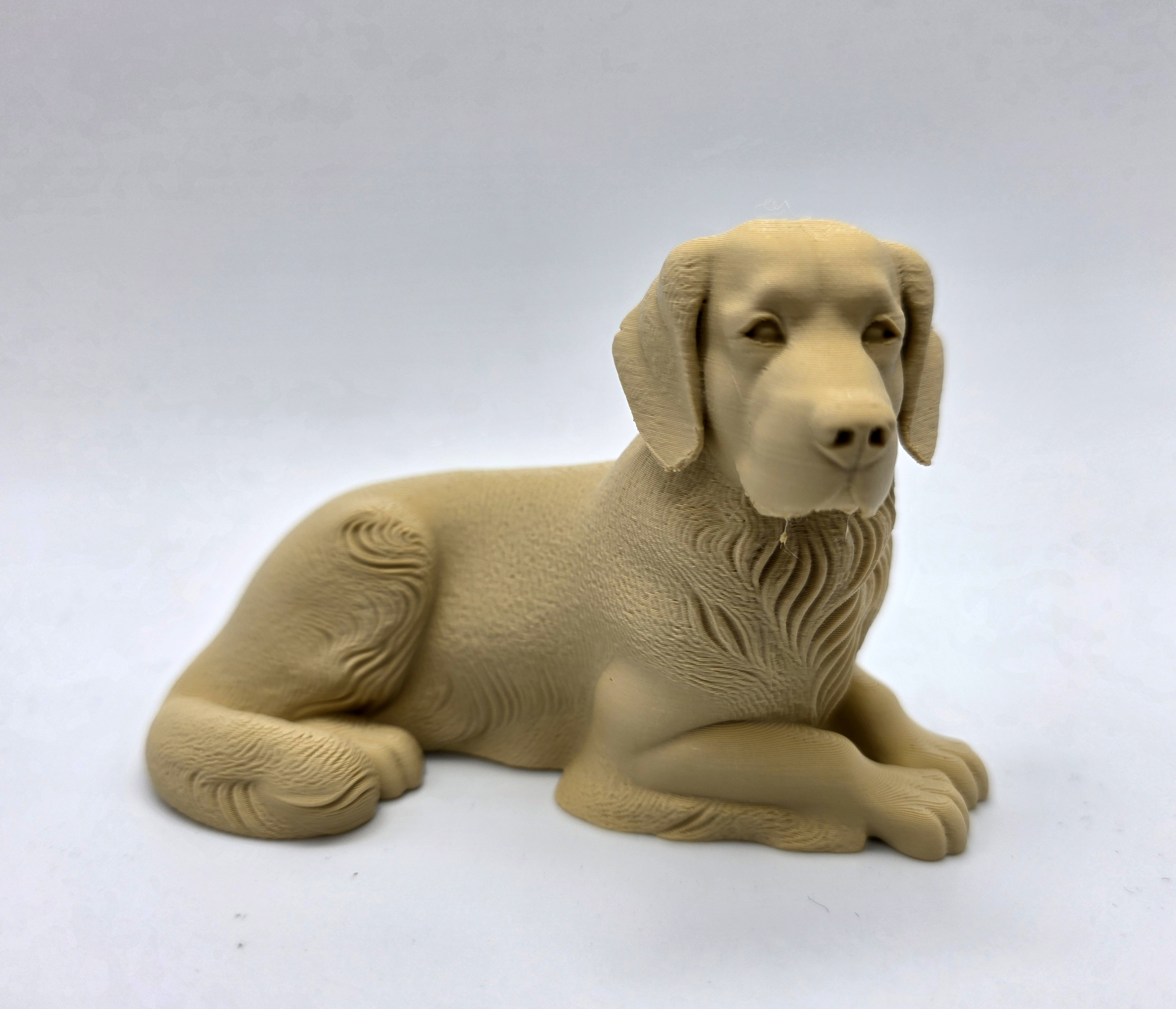 Laying Golden Retriever Figurine