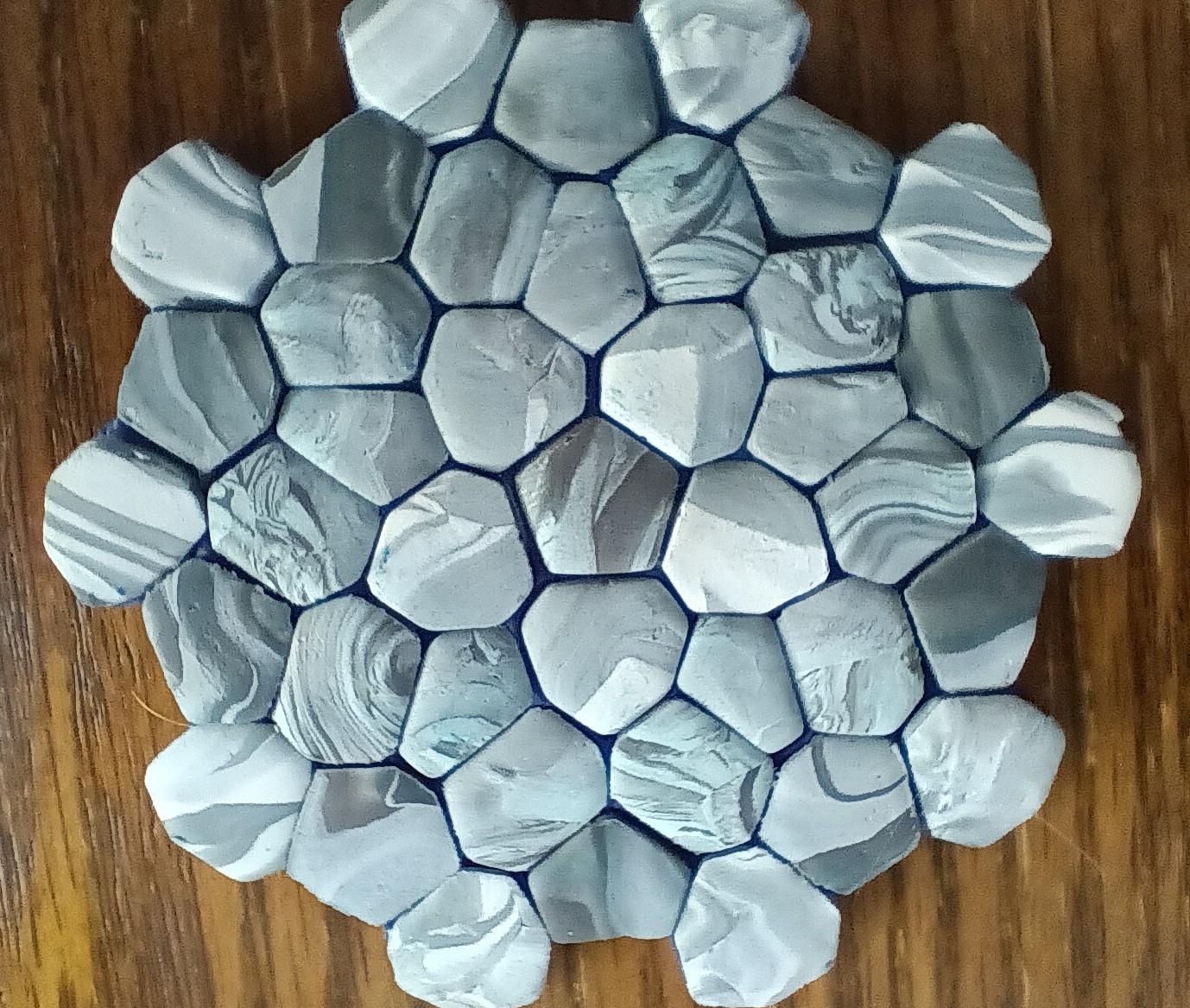 Polymer clay cutters for Penrose Voronoi diagram tiles.