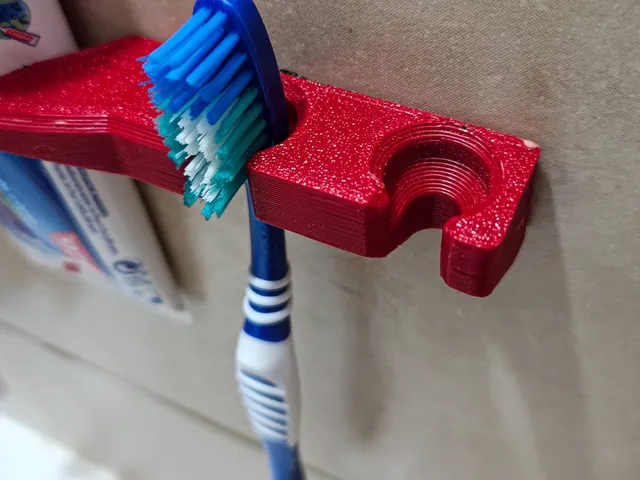 Toothbrush and toothpaste wall holder