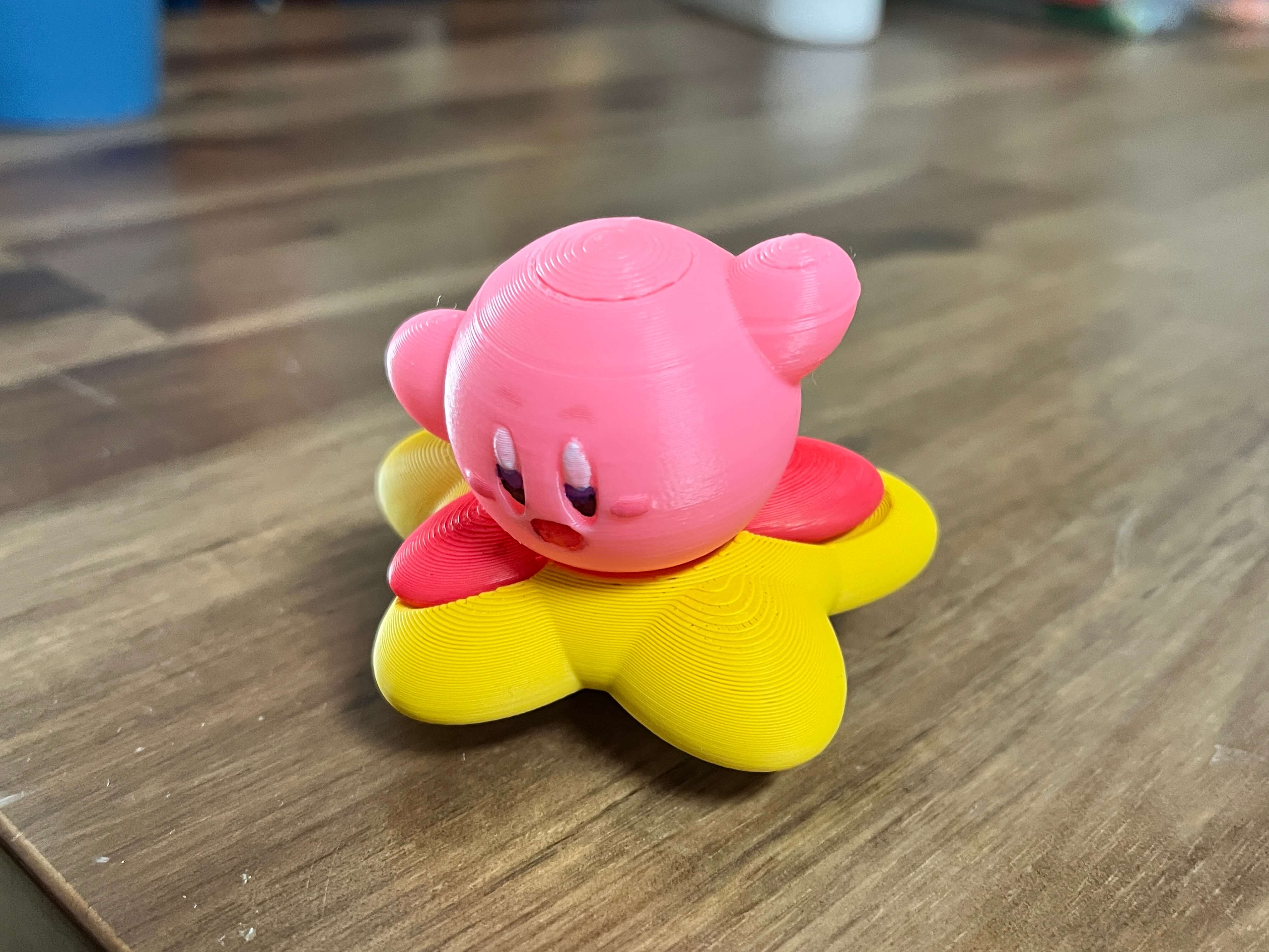 Kirby figurine with Warp Star base