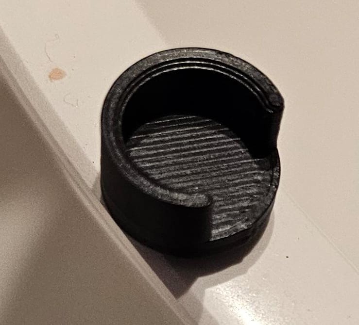 Cabinet push latch cap