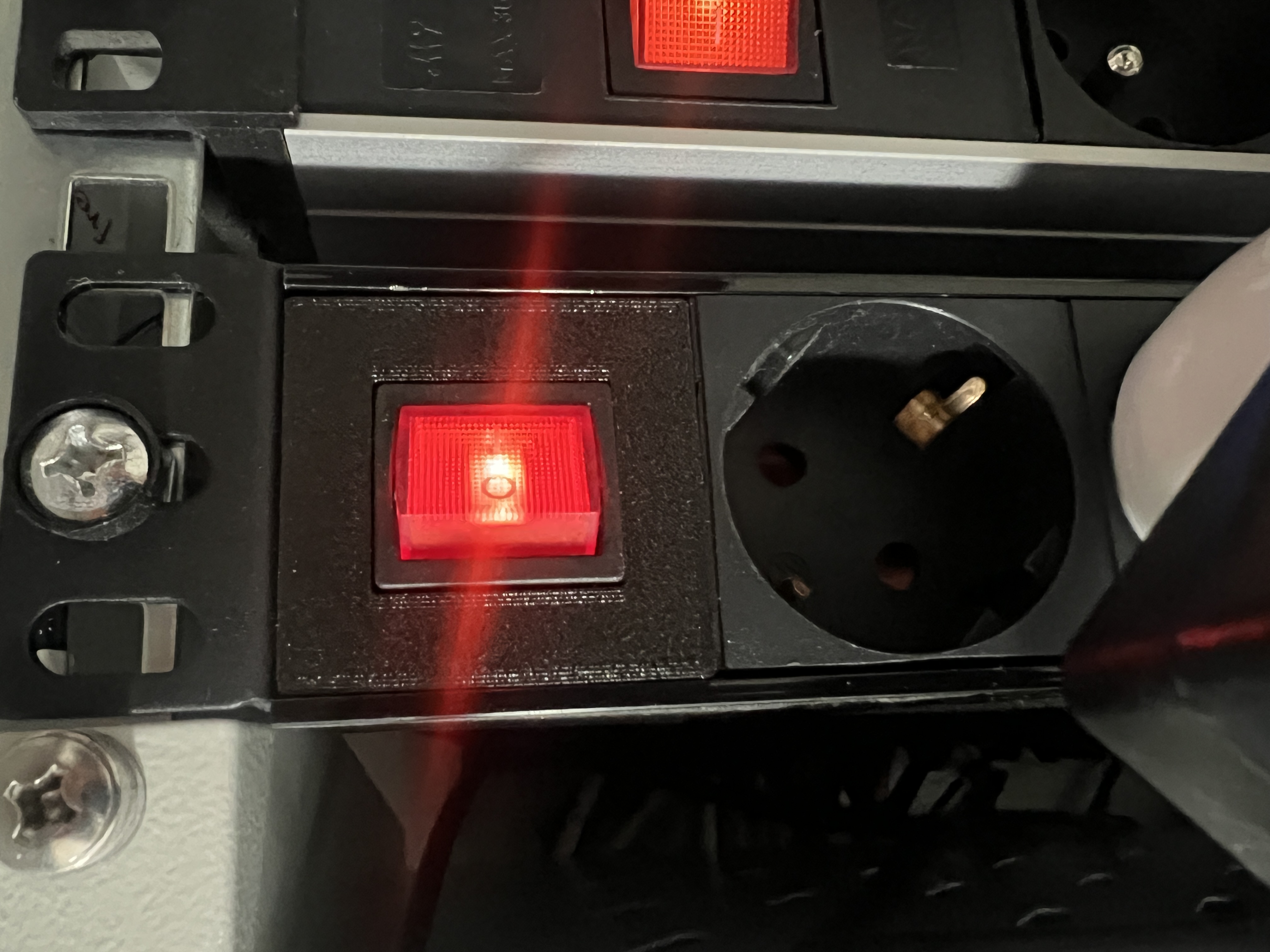 power strip switch holder (Equip)