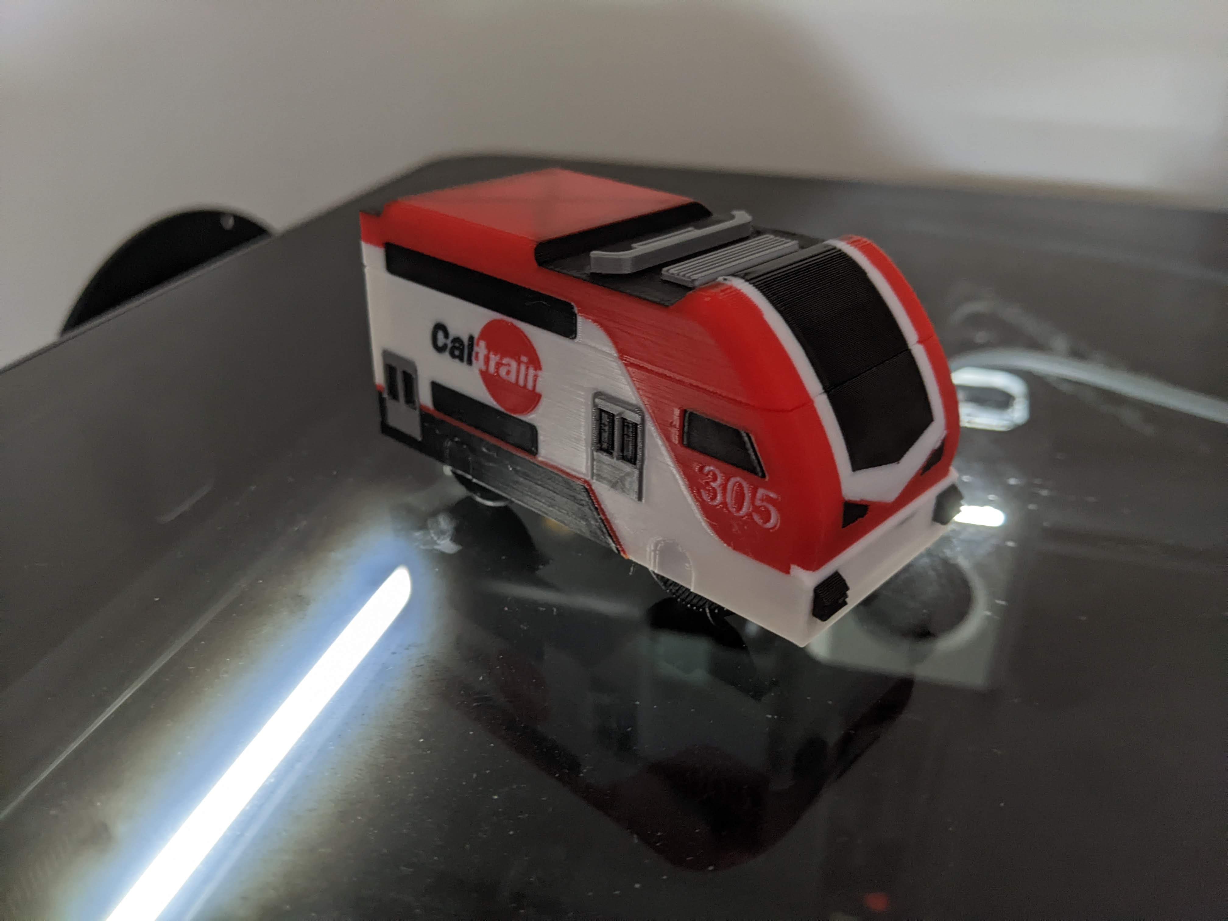 electric-caltrain-engine-for-wooden-rails-multicolor-by-choumarin