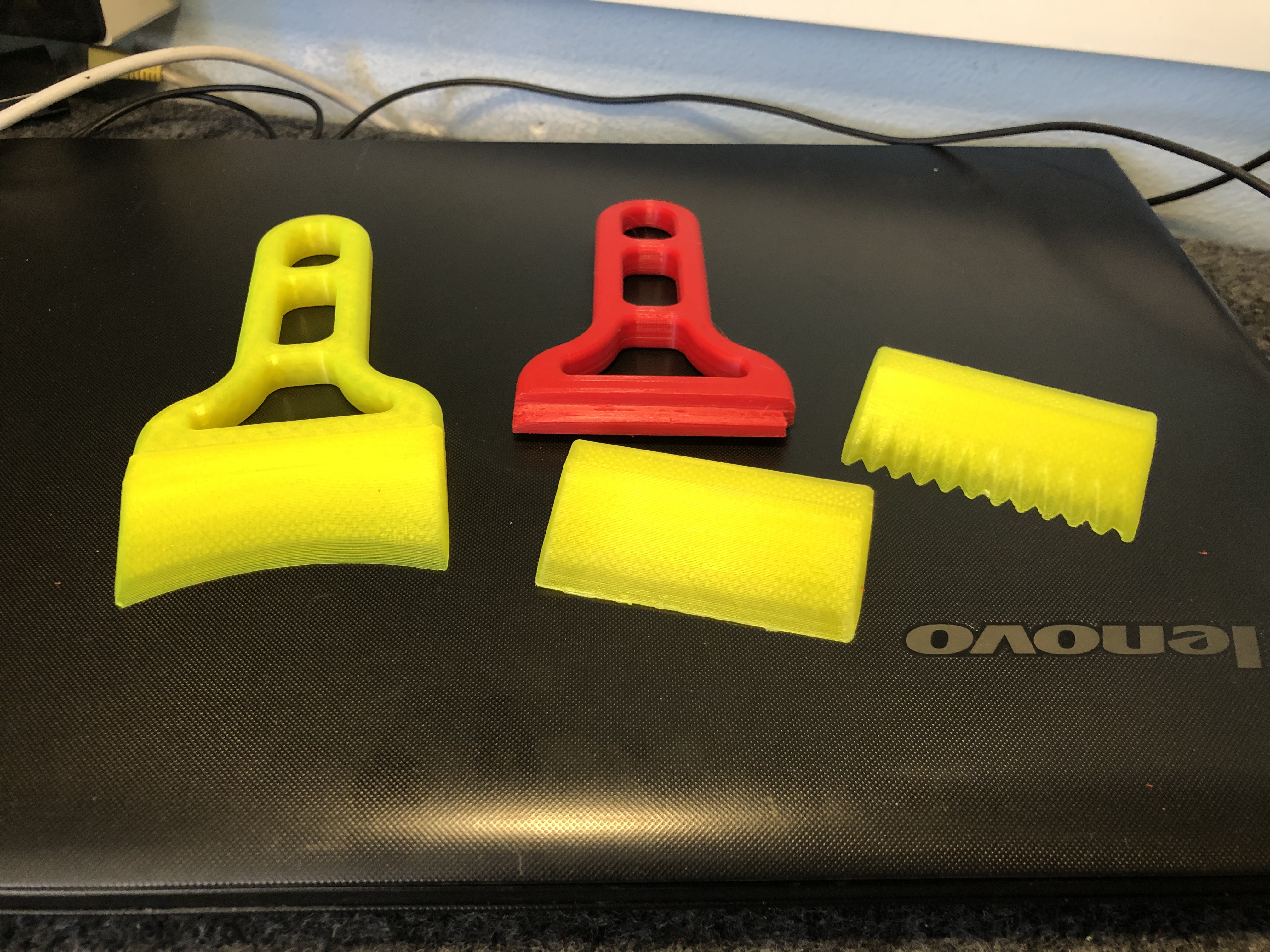 Printer bed scraper re-usable.