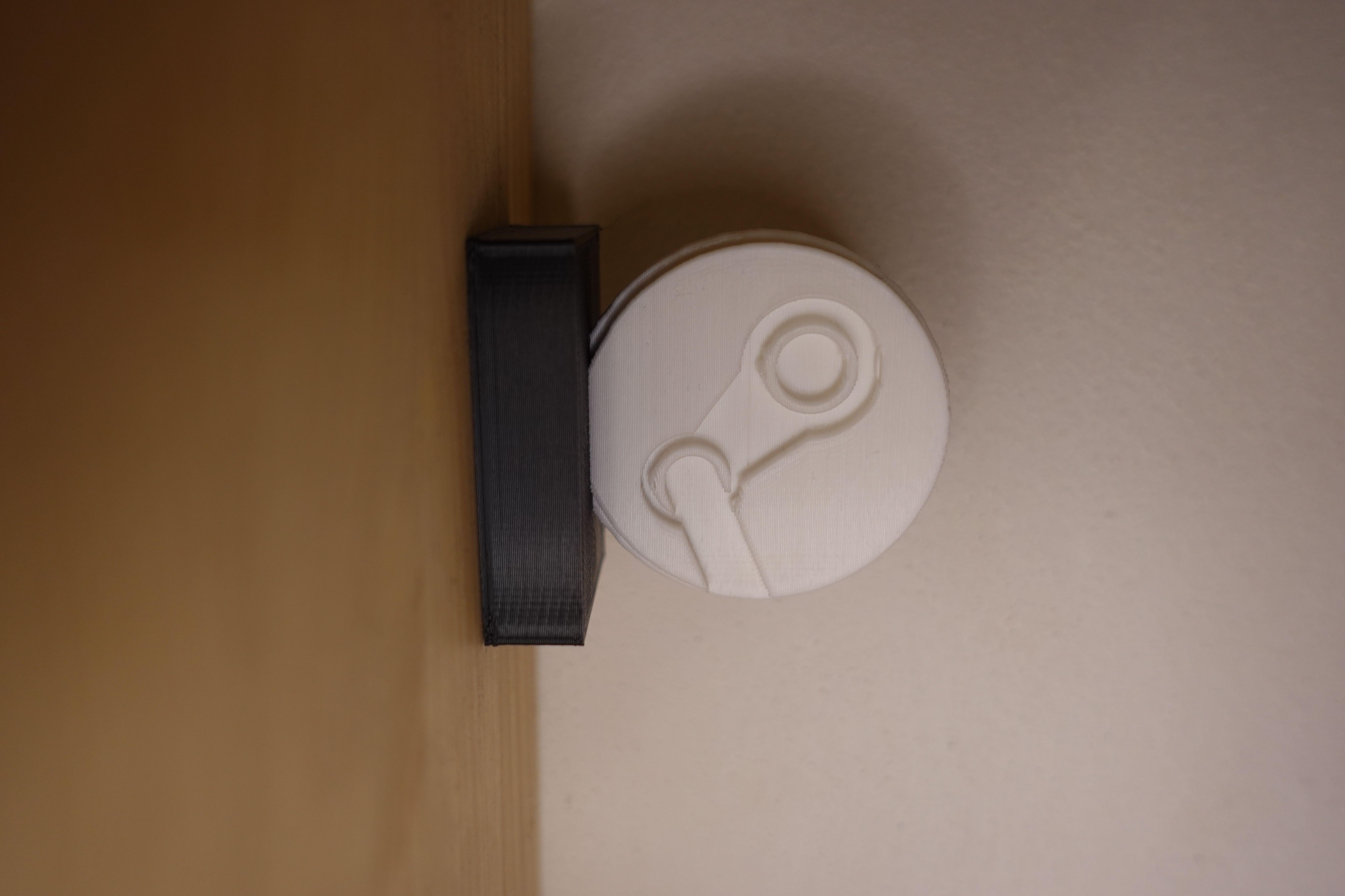 steam logo on the base