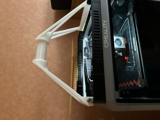K1 Max top mounted filament spool holder modded to use vented raiser from NorcoT