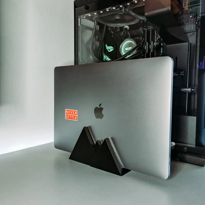 STL file Vertical laptop stand 19mm wide 💻・3D printer design to