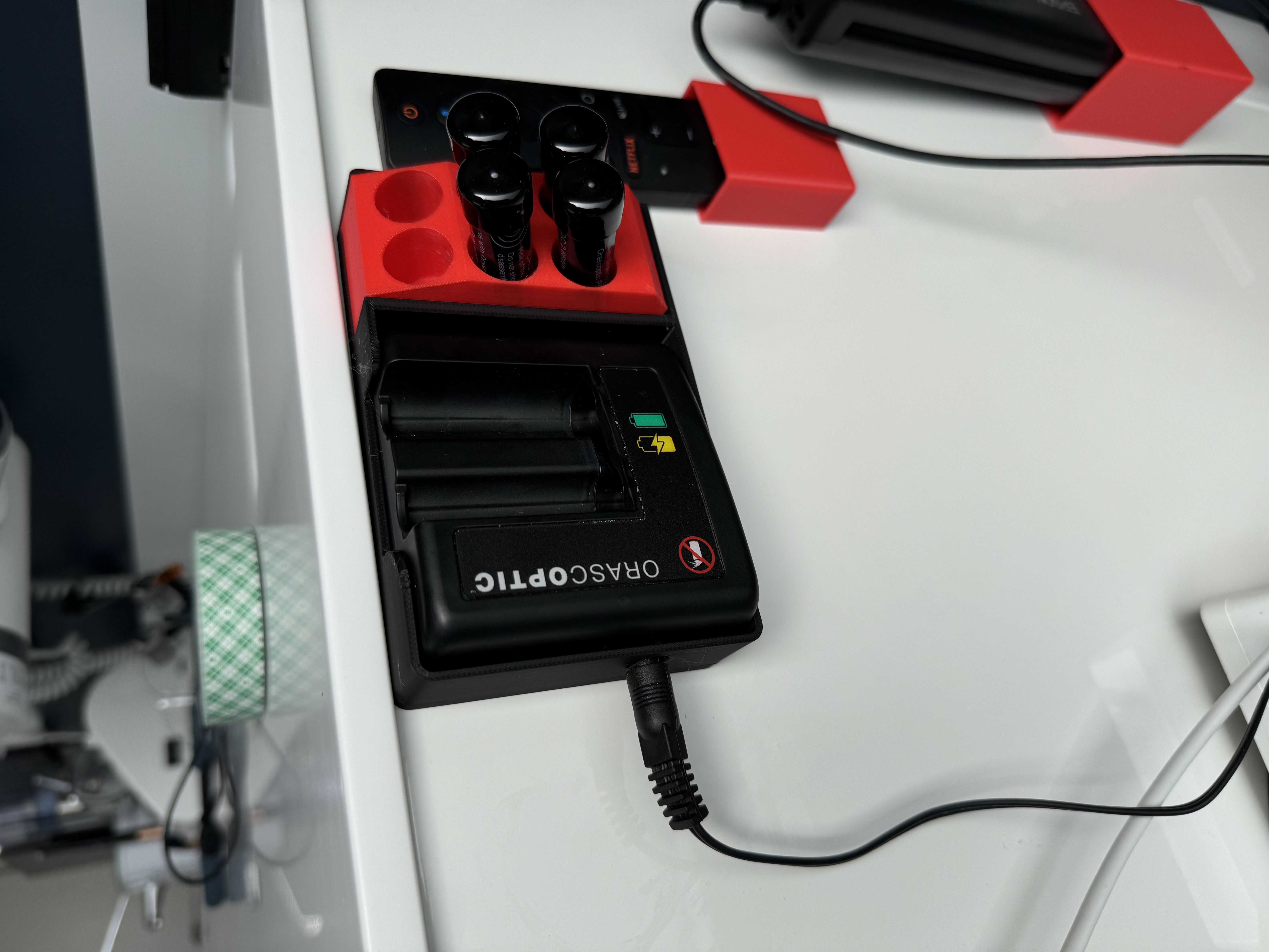 Porte chargeur pour loupes orascoptic