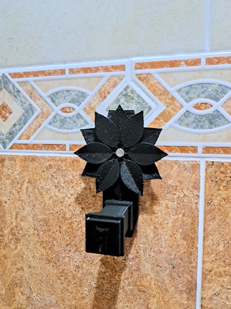 Ponsettia towel holder - Toallero con flor de ponsettia
