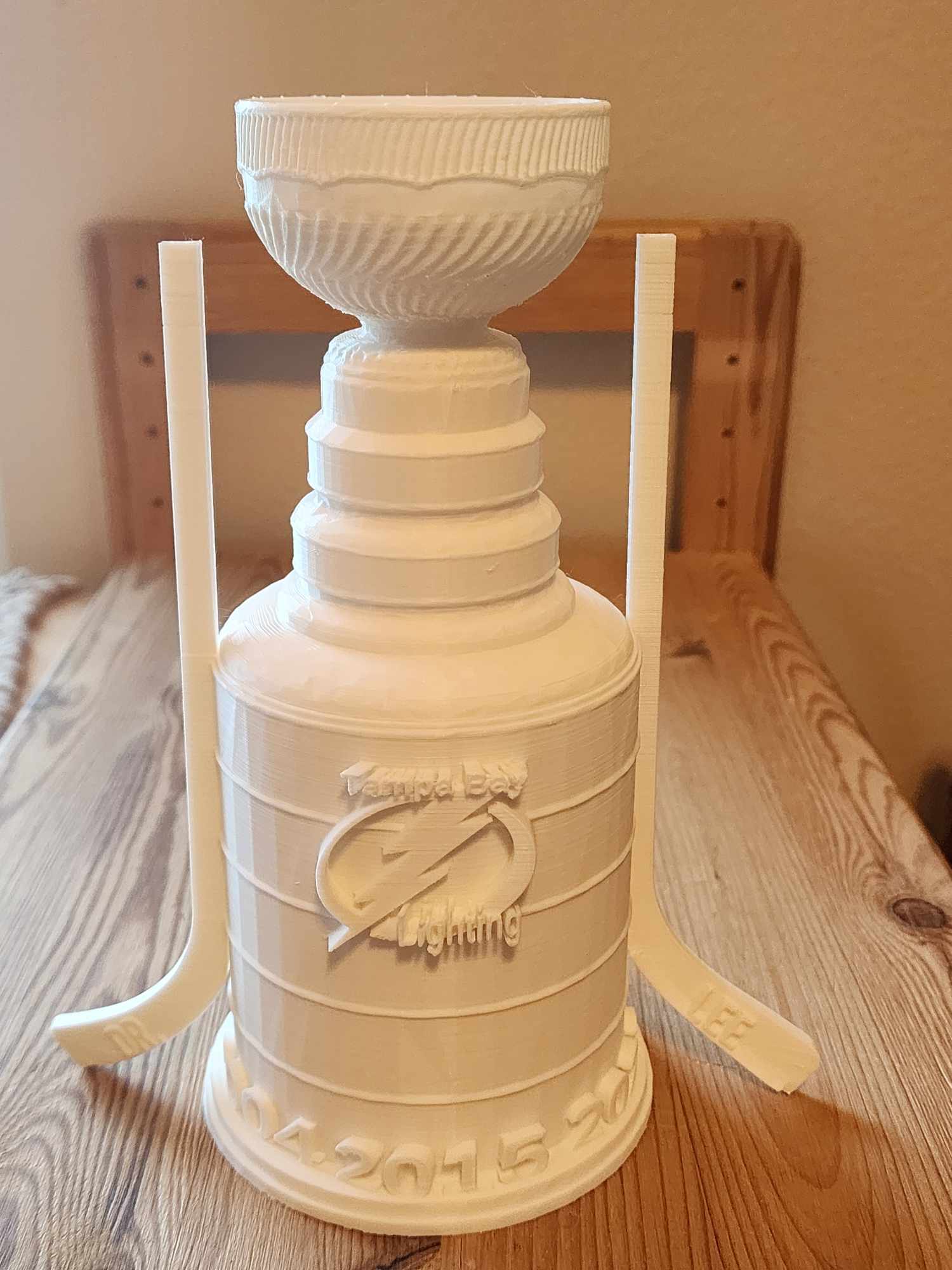 Tampa Bay Lighting championship cup with hockey sticks