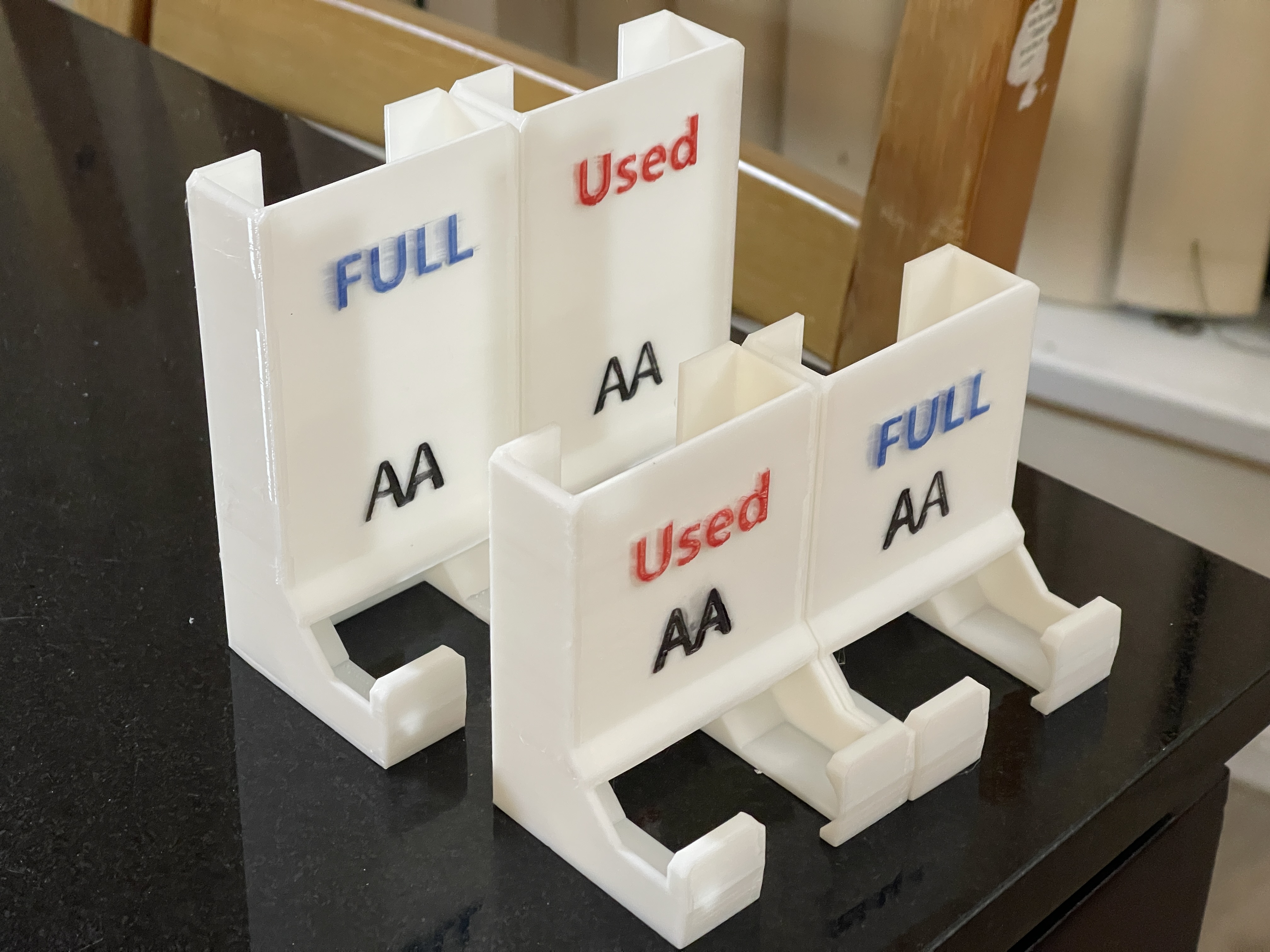 AA Battery dispenser for rechargeable battery