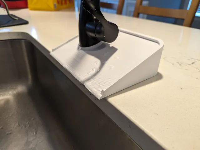 Sink drip pan with angle tester