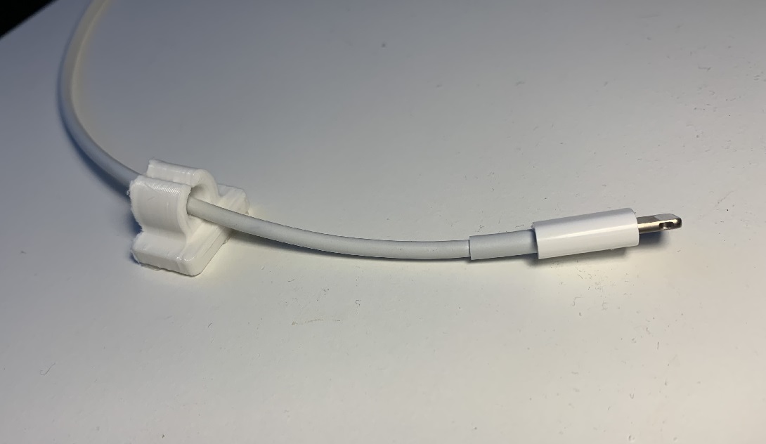 Charge cable holder for desk (FLEX)