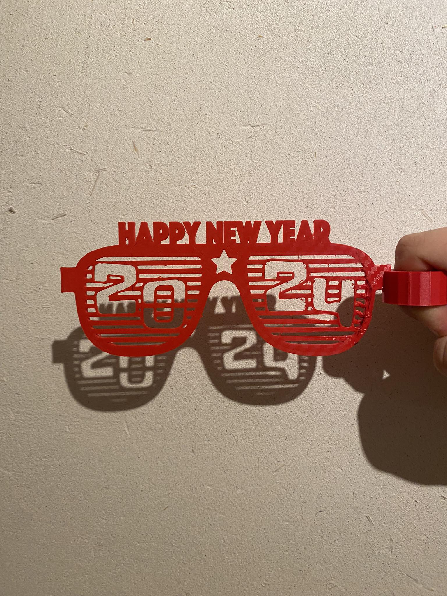 2024 New year finger held glasses by Augustas Kazlauskas Download