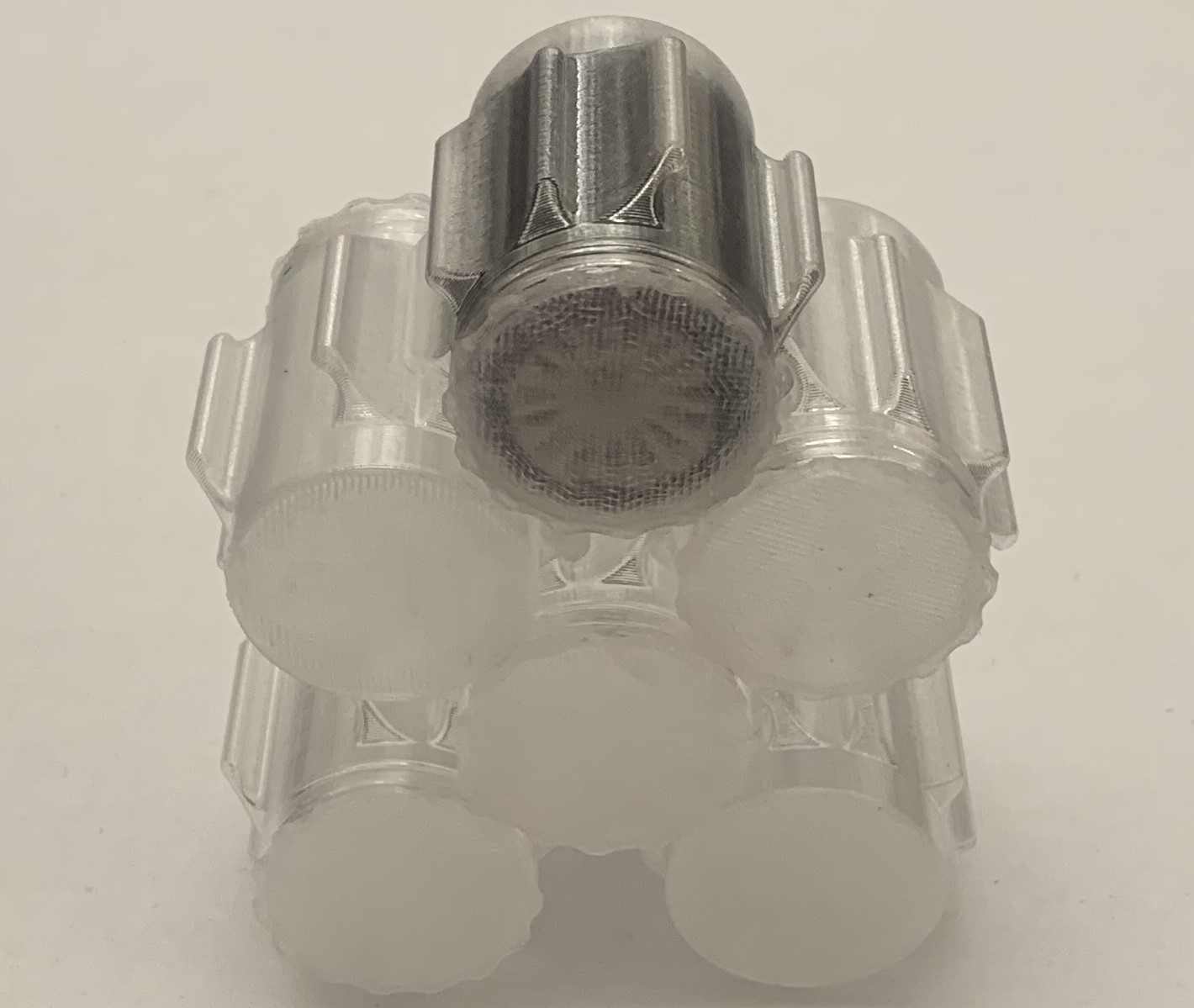 MiniZ tire container can with threaded cup stackable to a grid by