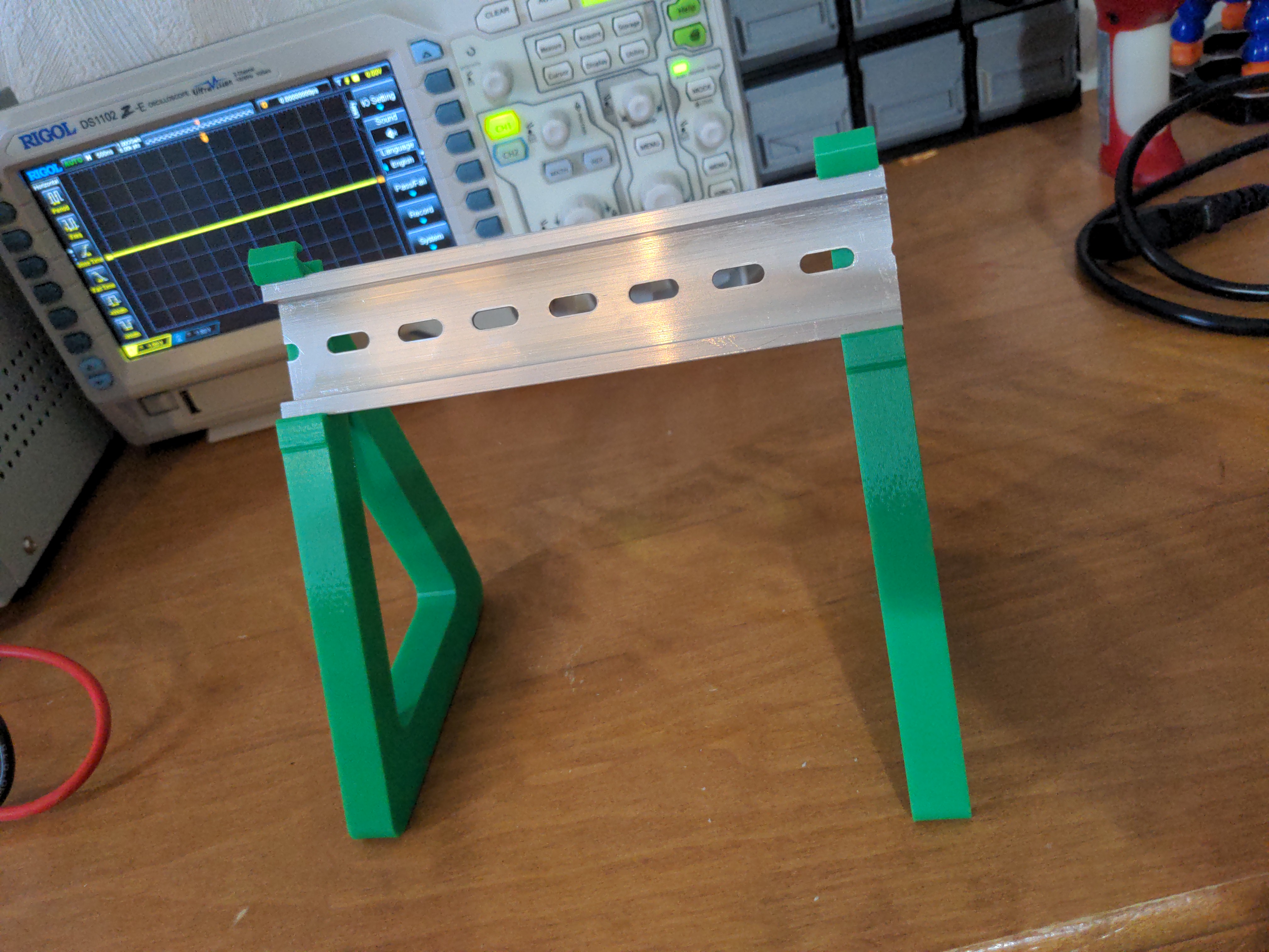 Snap-fit DIN rail stand