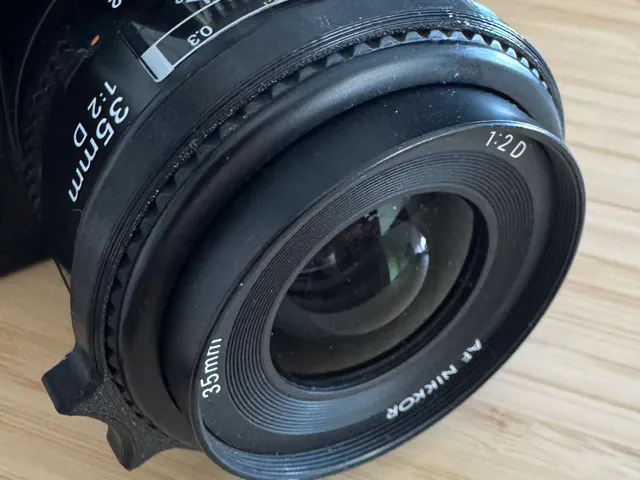 Focusing tab for Nikon 35mm AF lens