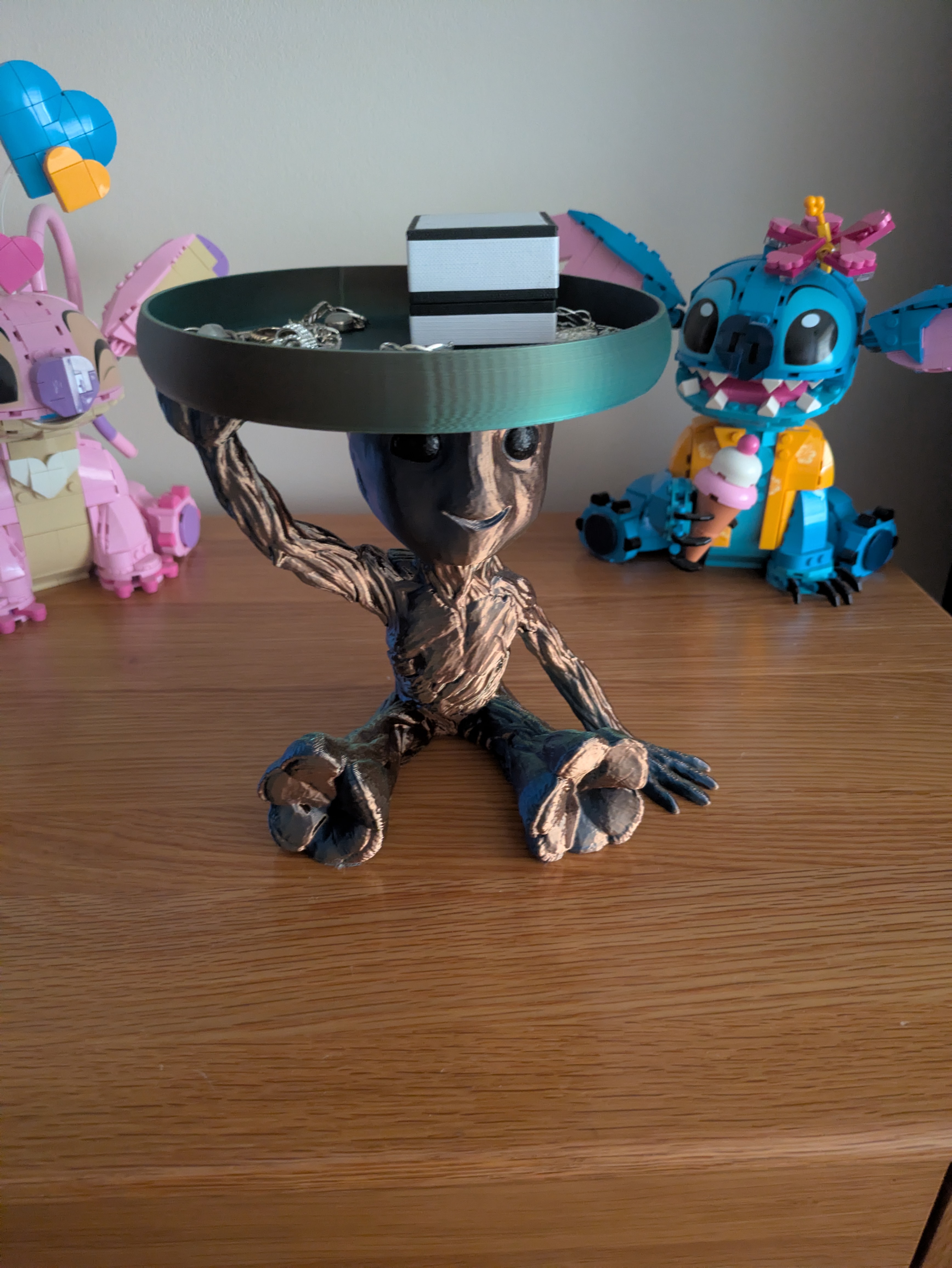 sitting groot with tray