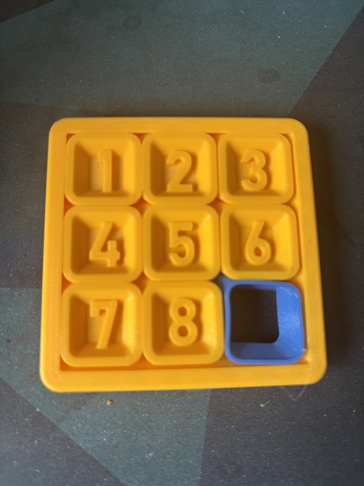 Spacer / stopper for numeric puzzle