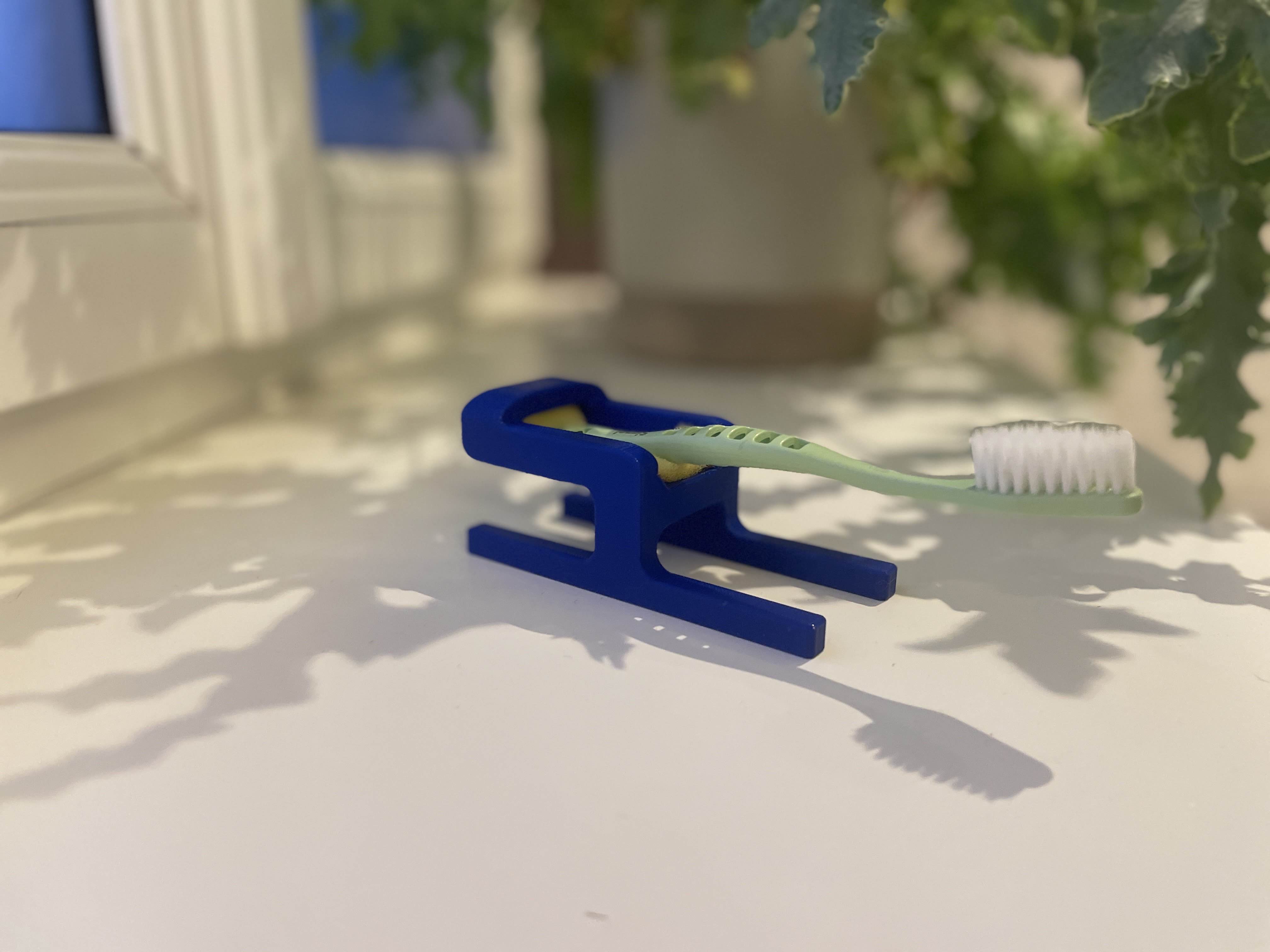 Toothbrush holder for one handed use. 3D model