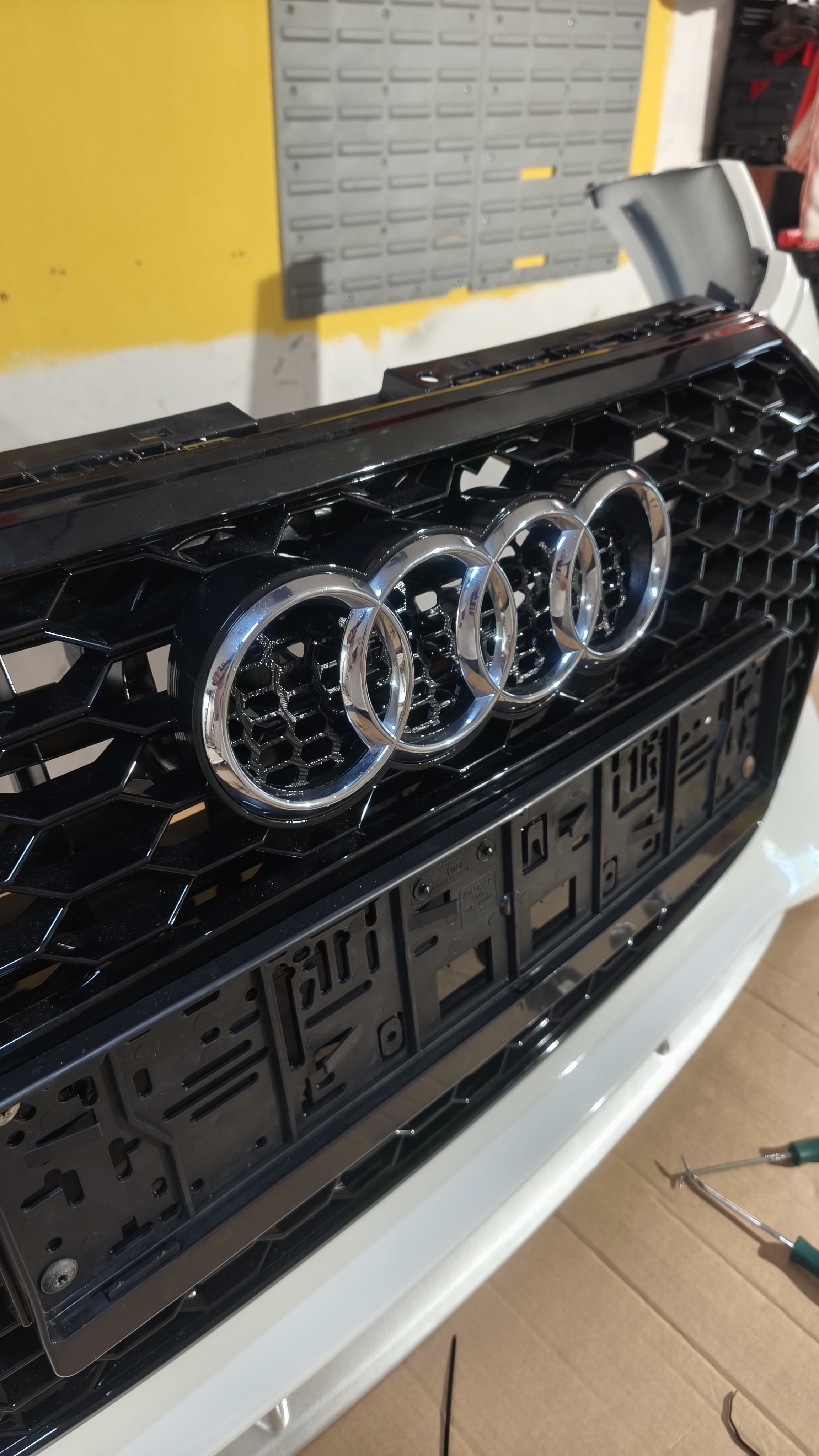 Audi logo holder