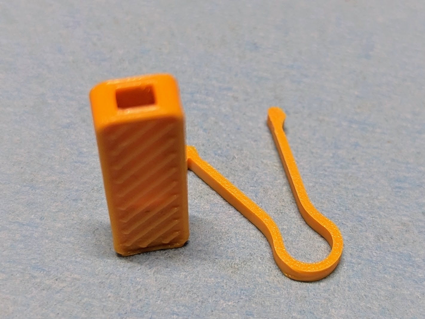 Zipper pull loop, stronger version