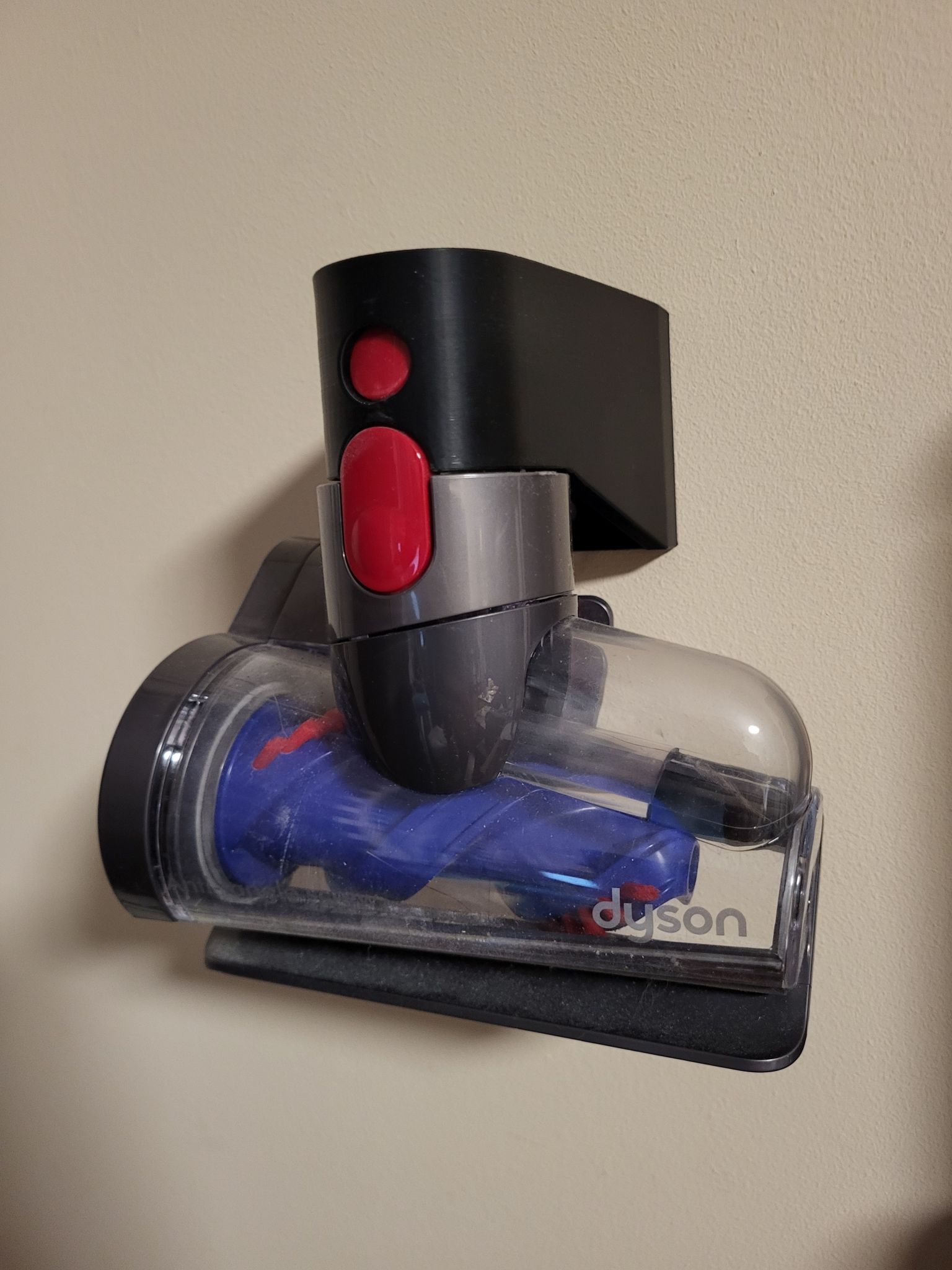 Dyson attachment holder