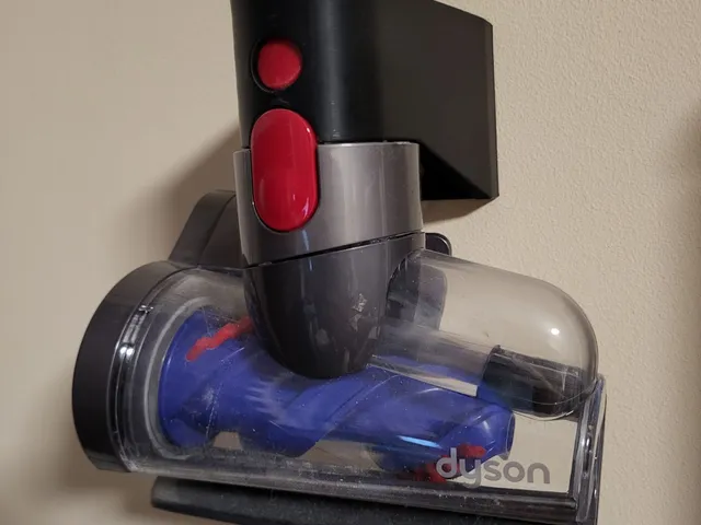 Dyson attachment holder