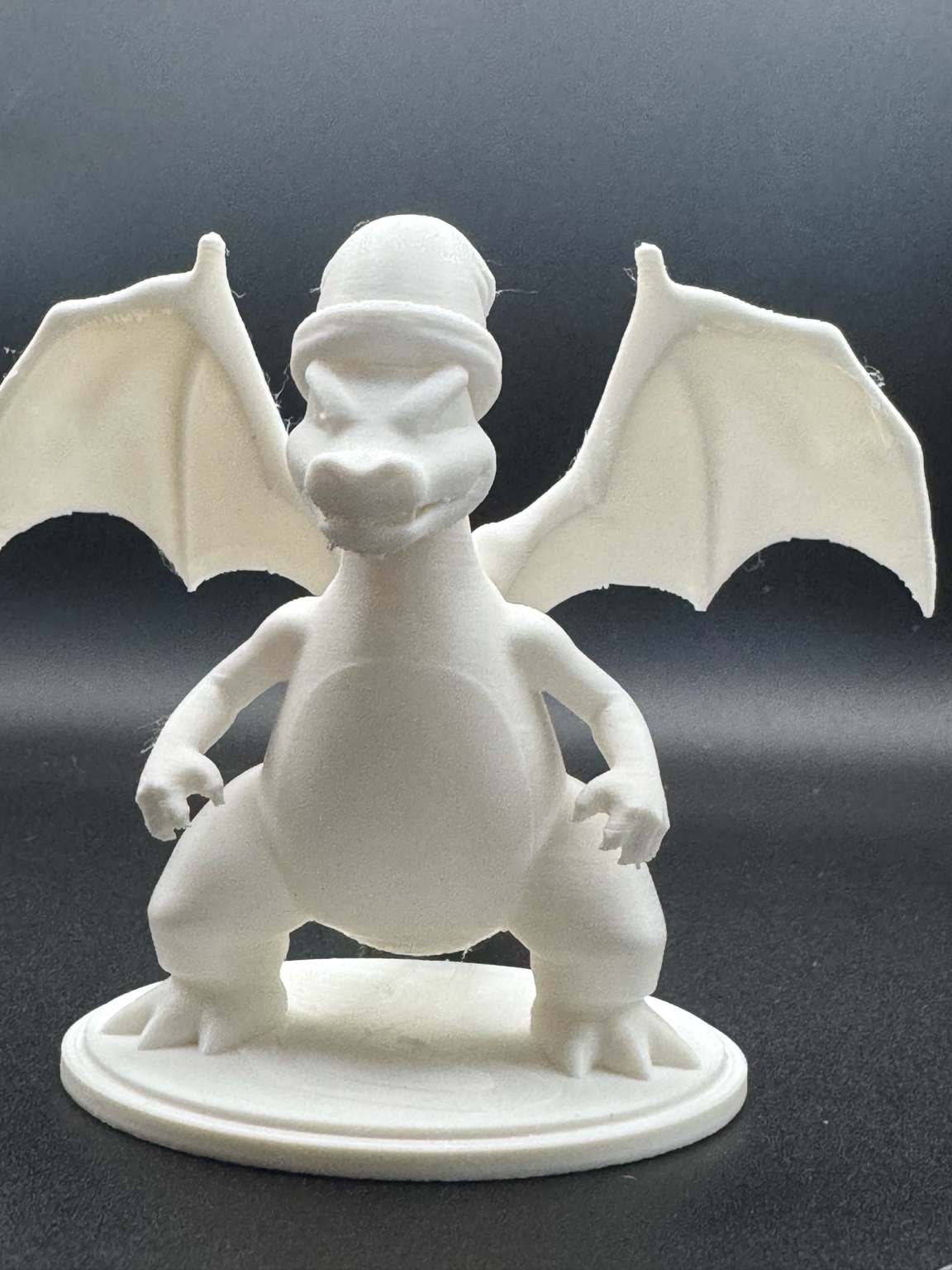 Charizard natalizio con basetta