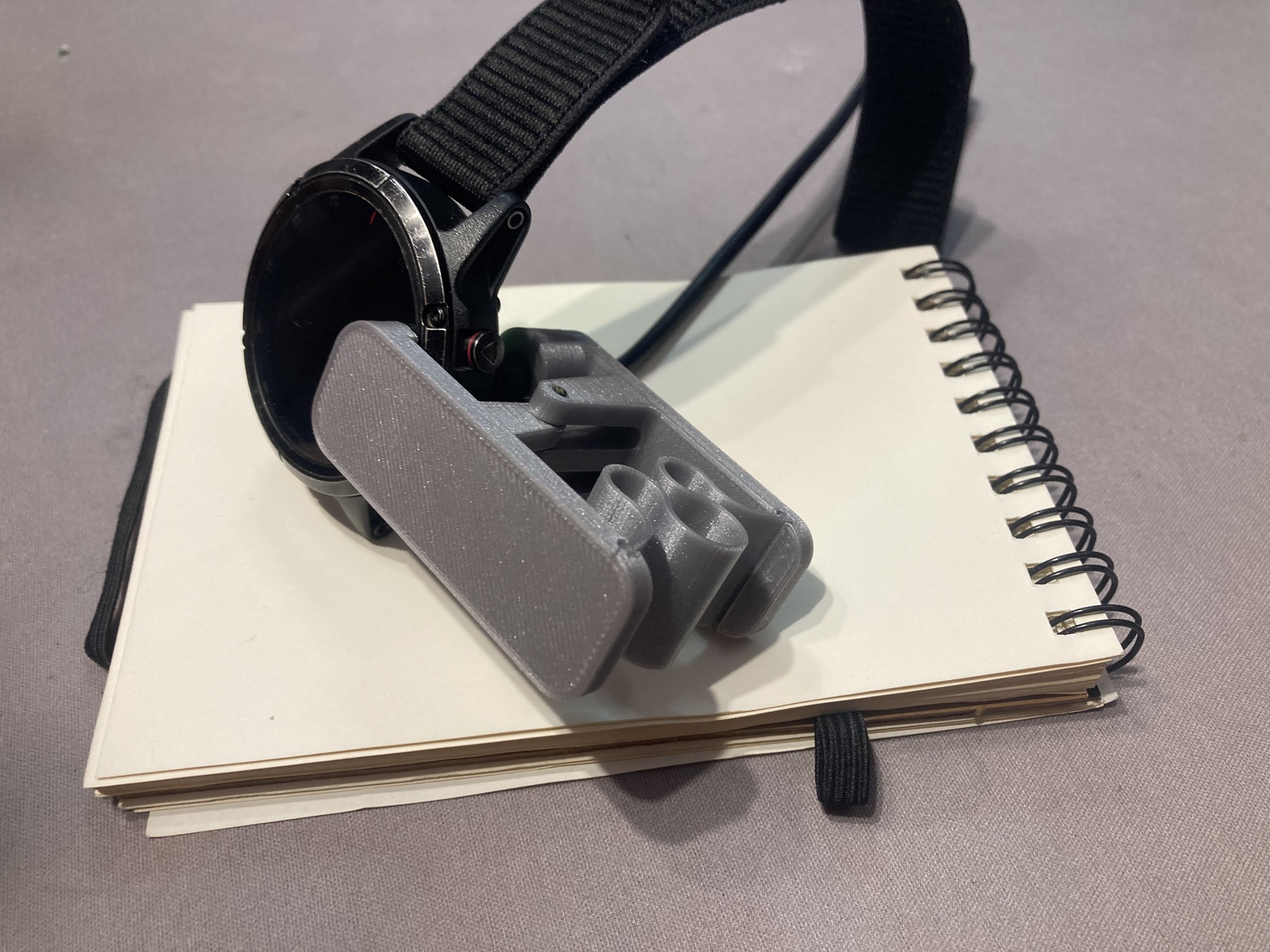 Clip for charging cable for Garmin clock