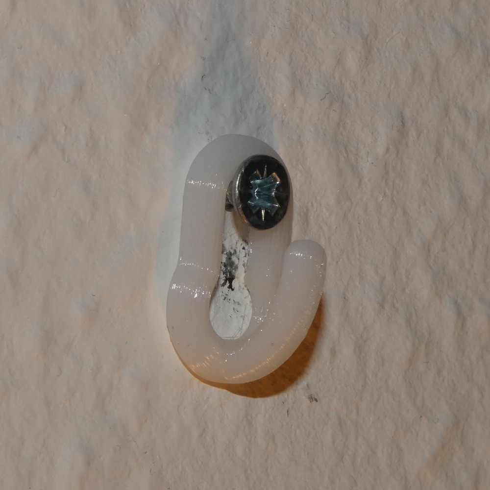 Wall hook to put on screw (2 versions)