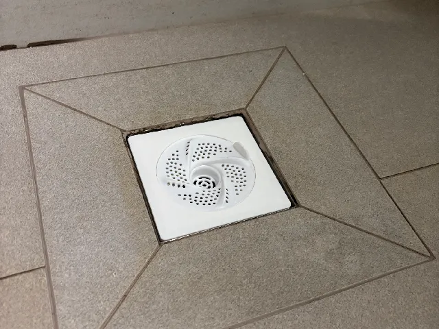 HDB BTO shower drain cover holder