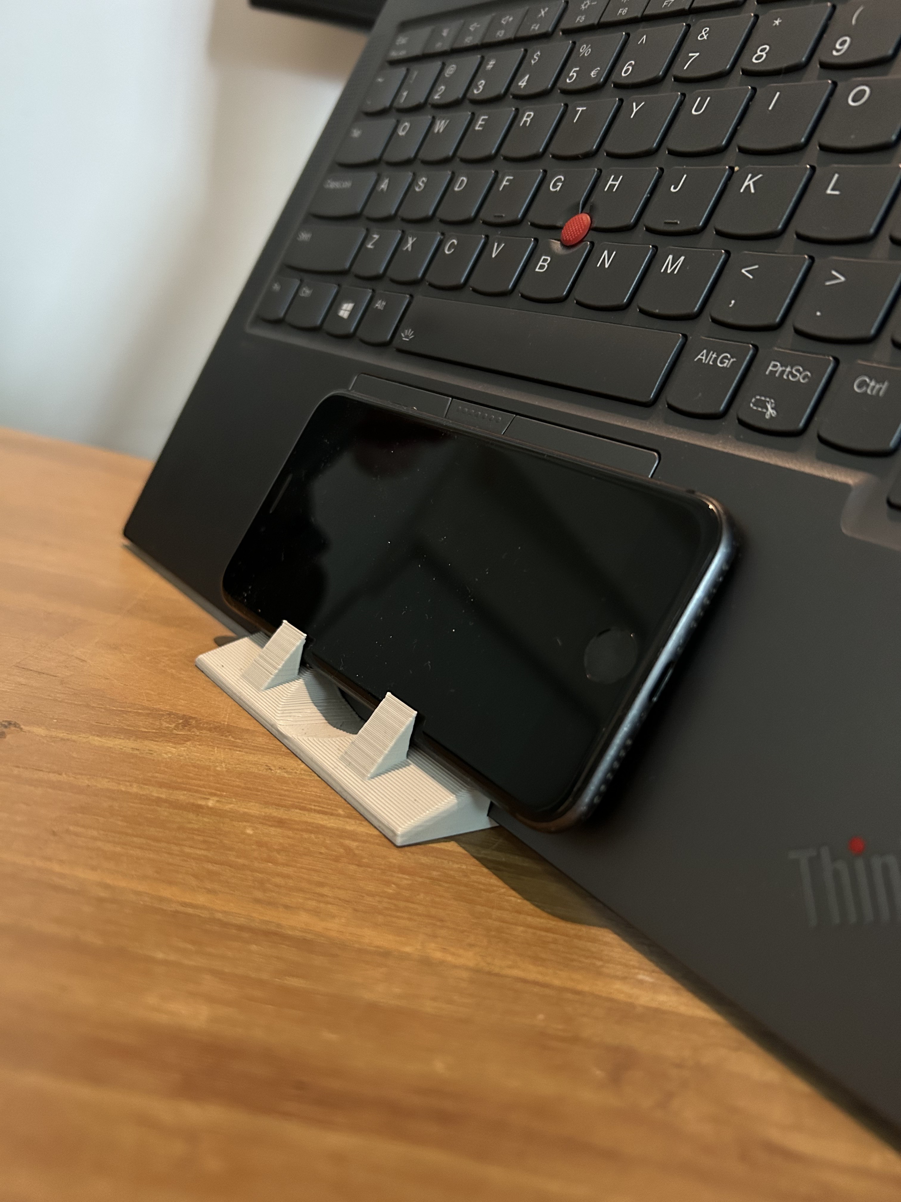 Vertical laptop stand with phone holder