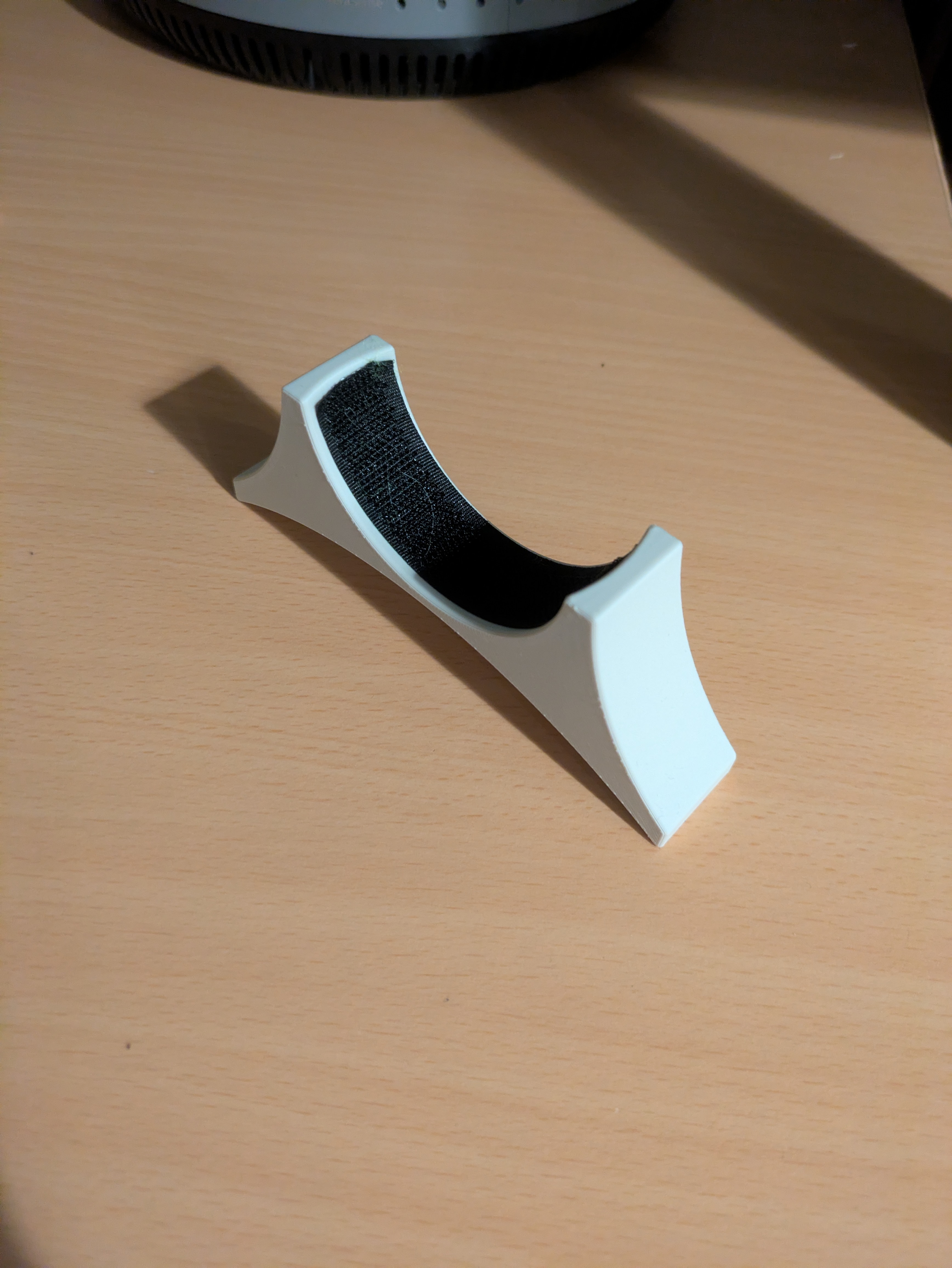 Padel racket ball holder