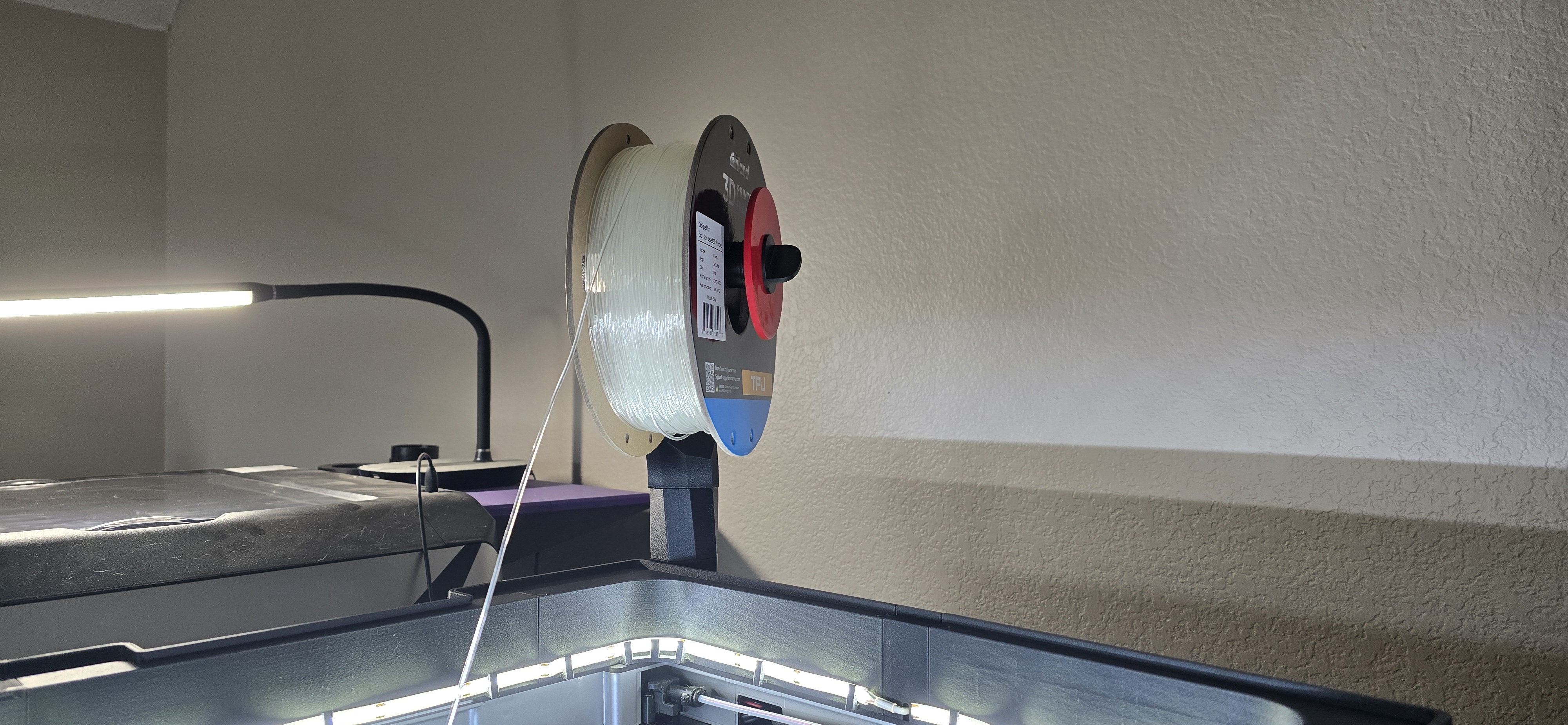 Versatile filament + Qidi dry-box spool mounting arm
