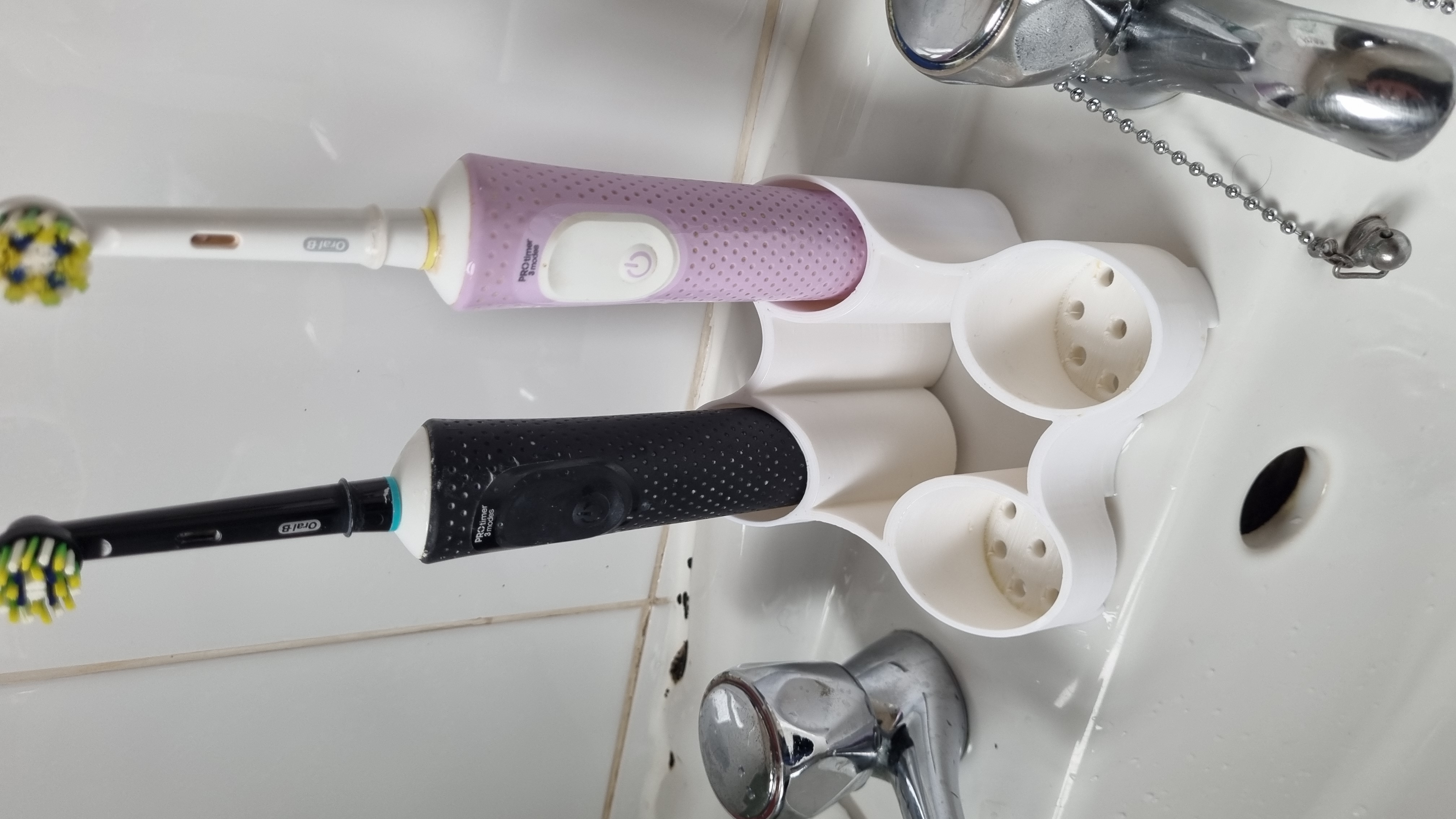 Electric toothbrush and paste holder